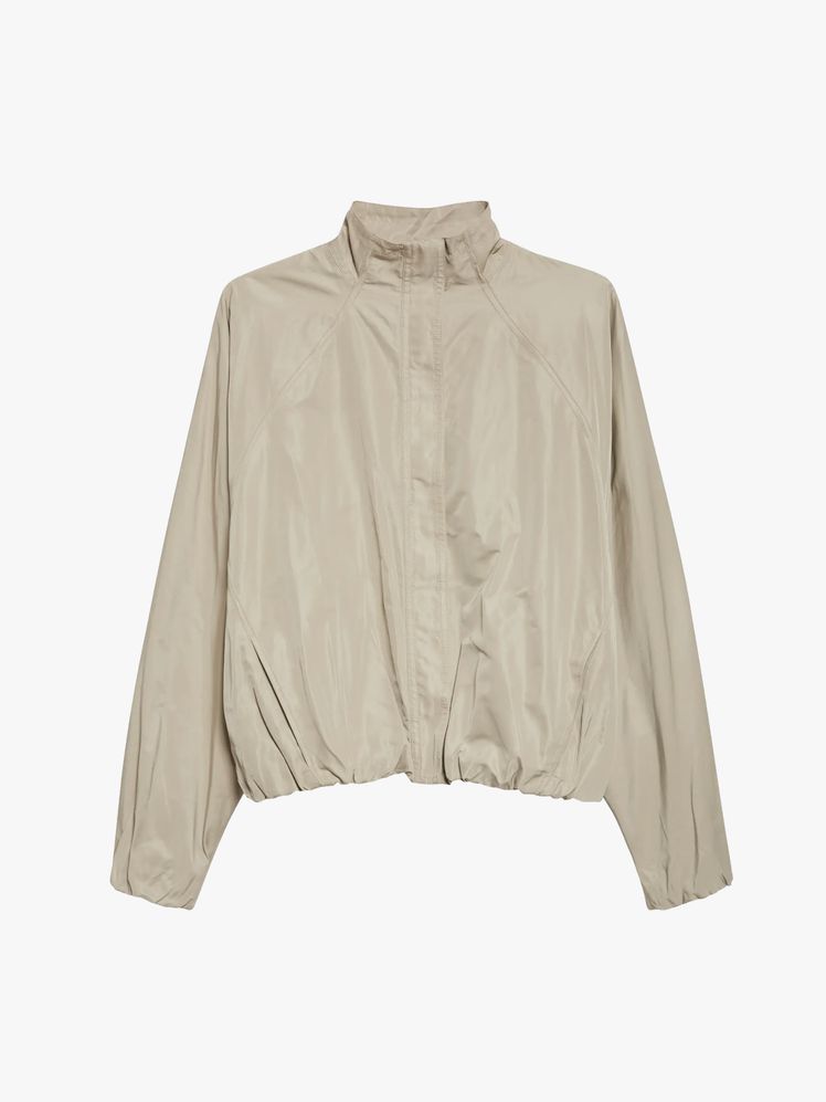 Image may contain: shirt, clothing, coat, jacket, long sleeves and sleeves