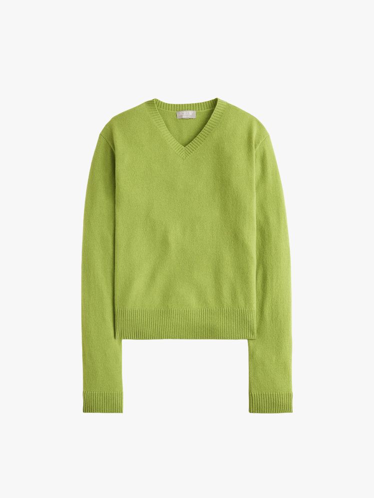 Image may contain: clothing, knitwear, sweater, long sleeves, sleeves and sweatshirt