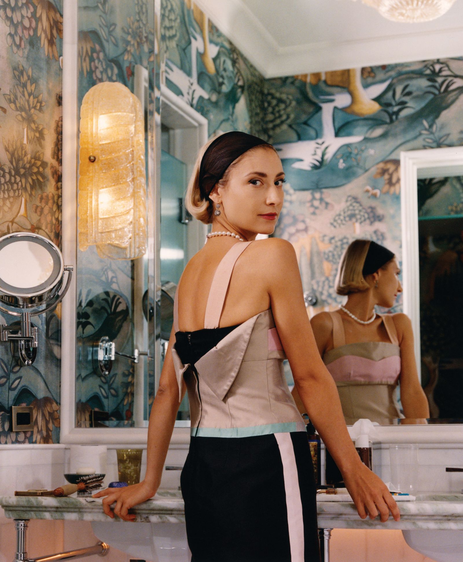 Image may contain adult changing room interior and room