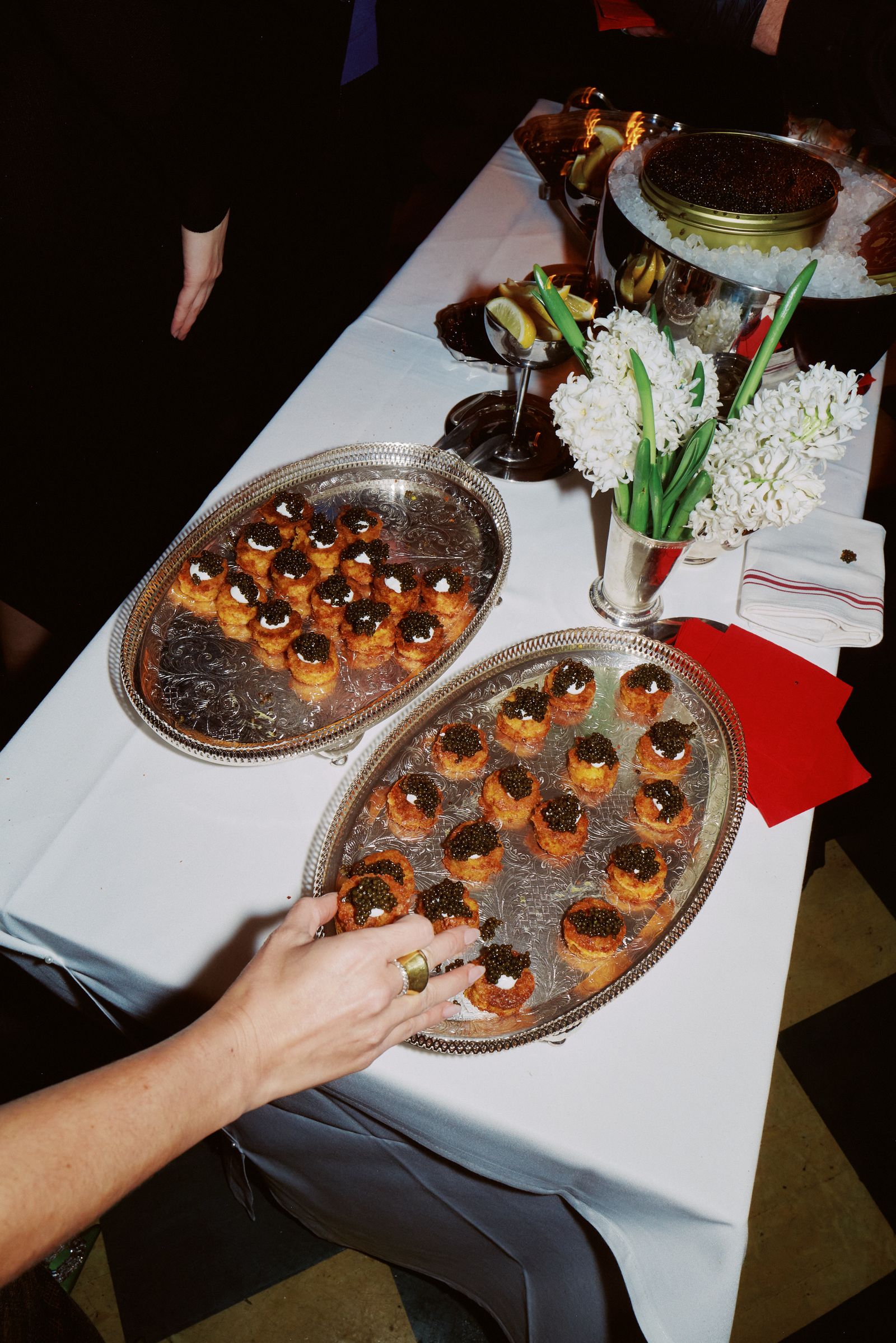 Pictures may contain food, food display, dinner plates, adult dining table furniture, tables and weddings