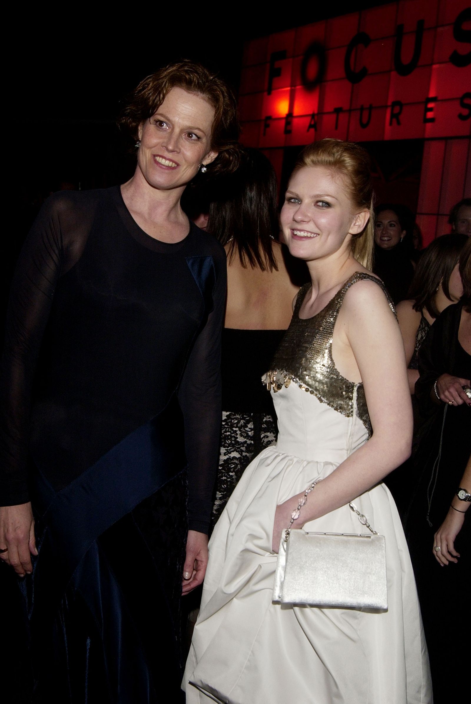 Image may contain Sigourney Weaver Kirsten Dunst Fashion Clothing Dresses Adult Photobombing and Weddings
