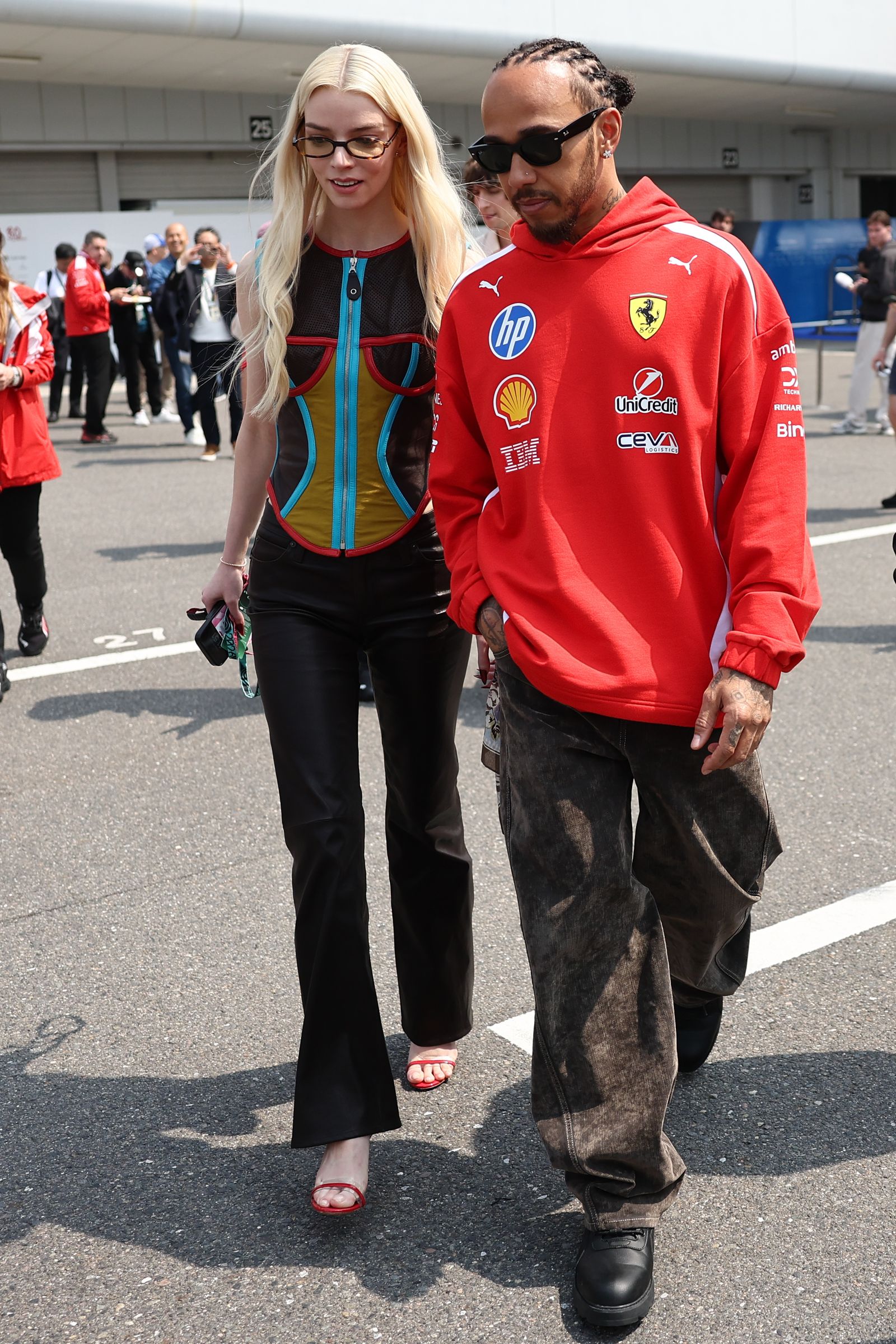 Ferrari's Anya TaylorJoy and Lewis Hamilton ahead of the Japanese Formula 1 Grand Prix at Suzuka Circuit...