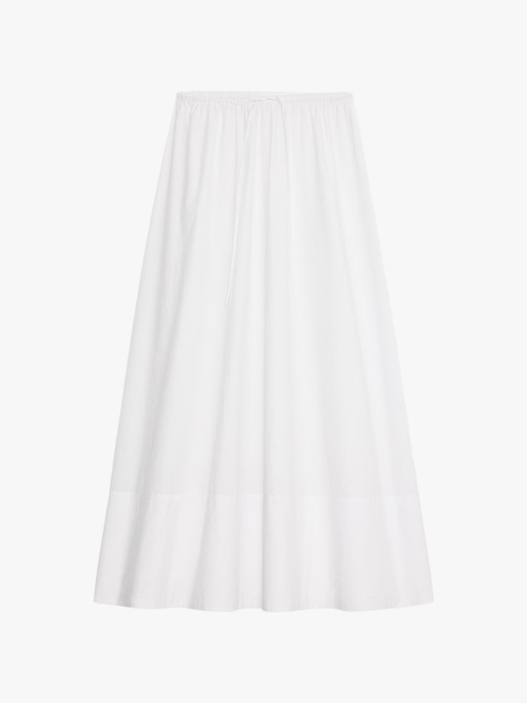 Image may contain: clothes, skirt and miniskirt