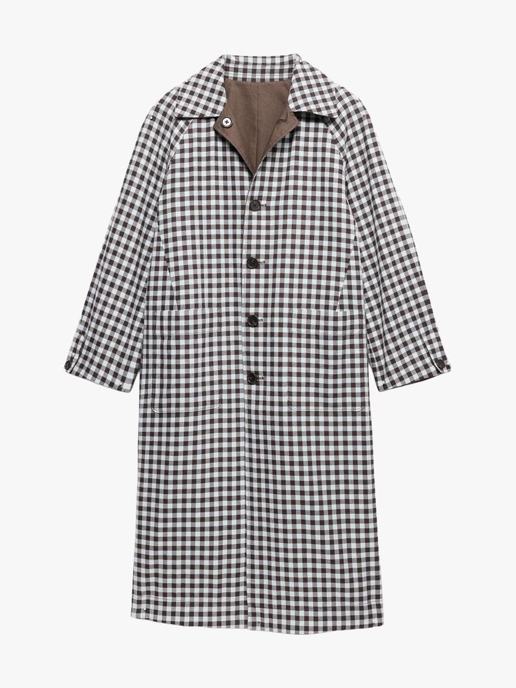 Image may contain: clothes, shirt and jacket