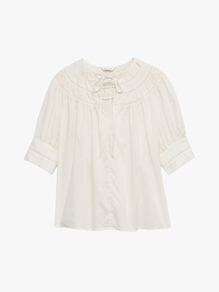 Image may contain: shirt, clothes, sleeves and long sleeves