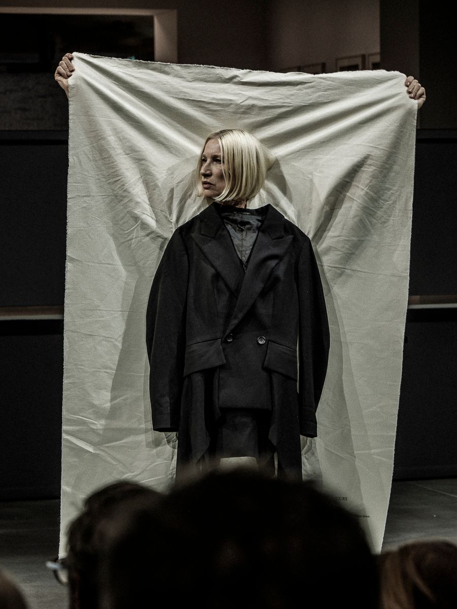 Image may contain clothing, outerwear, adult and fashion