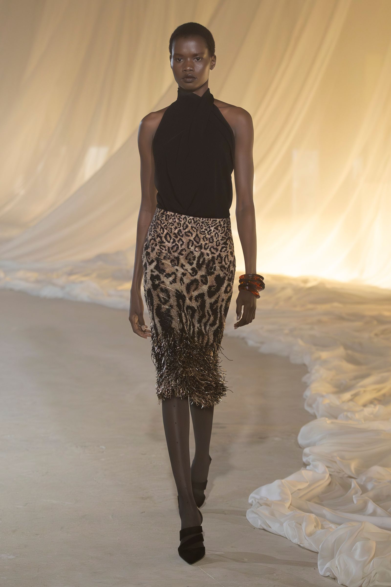 Image may contain clothing, skirts and shirts