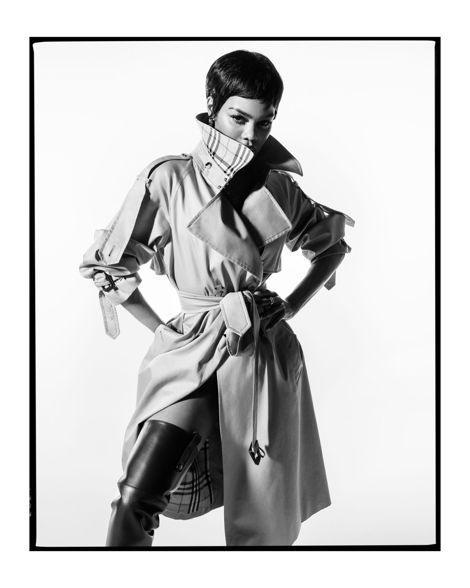 Image may contain Teyana Taylor Clothing Outerwear Adult Coats Gloves Footwear Shoes Fashion Face and Head