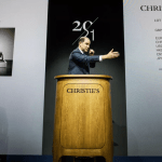 A man behind the podium.