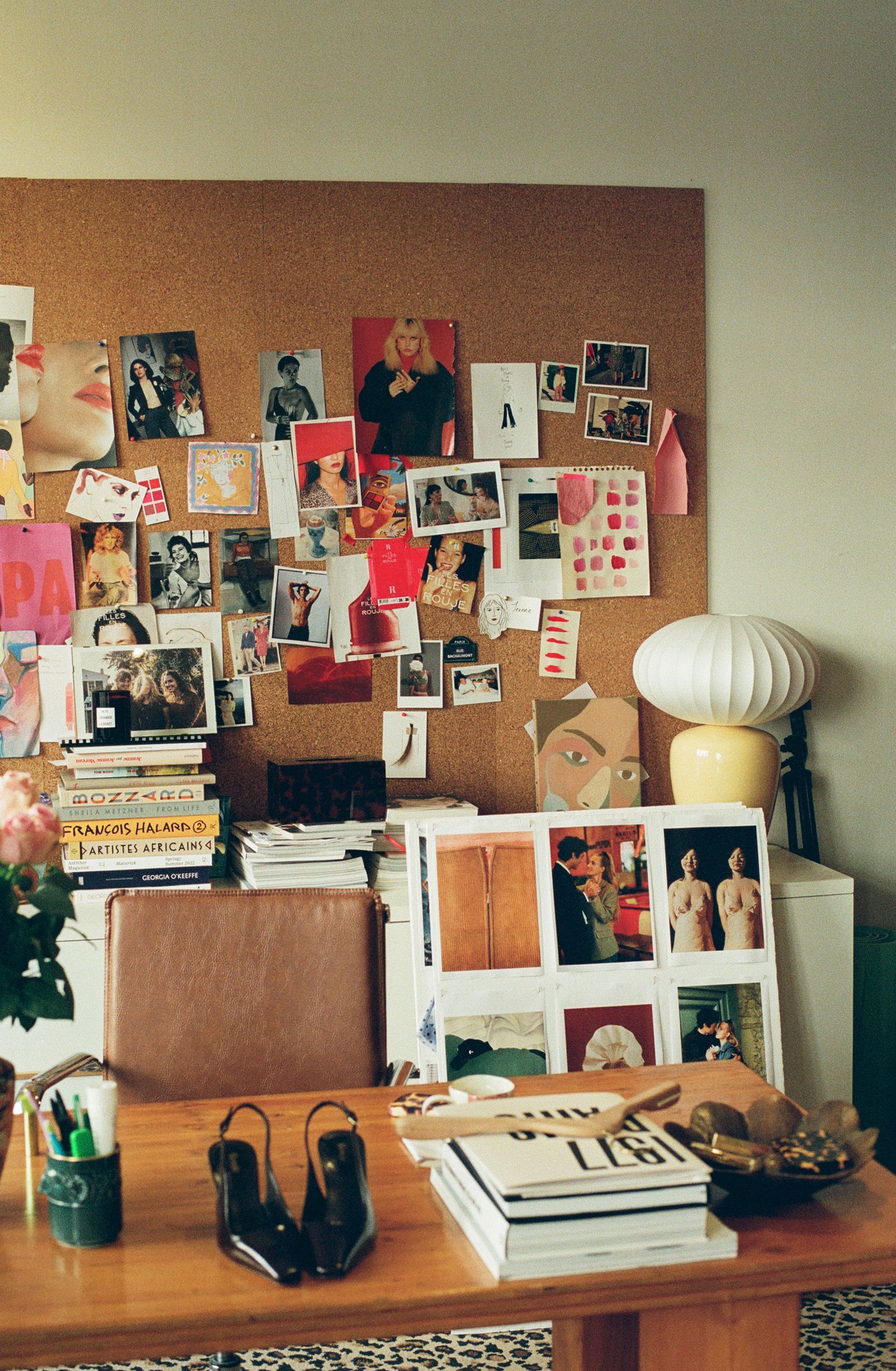 Image may contain Jenny Boyd furniture, table, adult interior design, bed, bedroom and dorm room