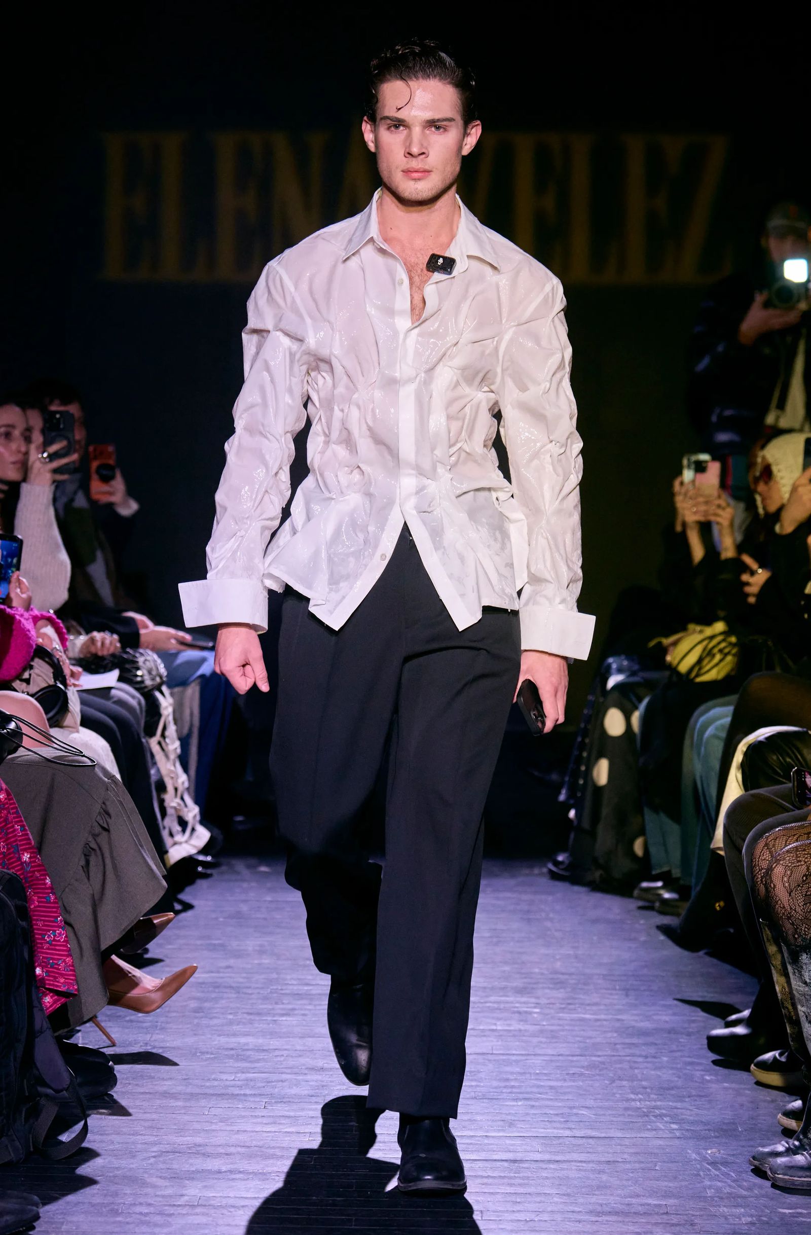 Image may contain fashion adult accessories, bags, handbags, clothing, long sleeves, sleeves, pants, face and head