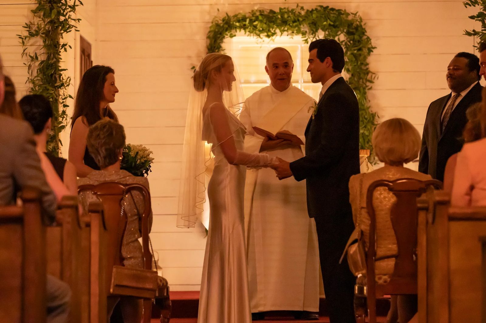 Pictures may contain weddings, adult plants, potted plants, exchange of vows, clothing, formal wear and suits