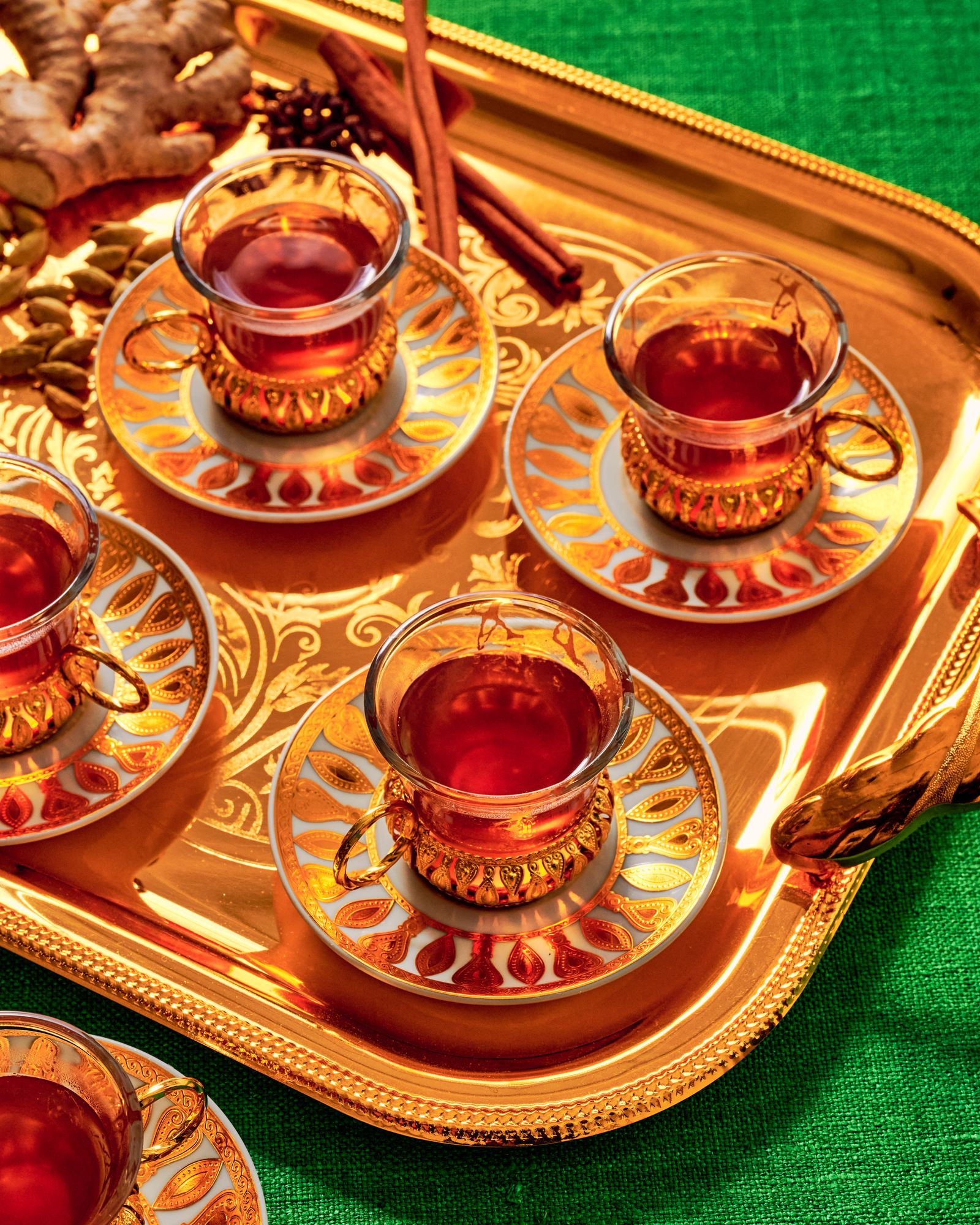 Image may contain cups, drinks, tea and saucers