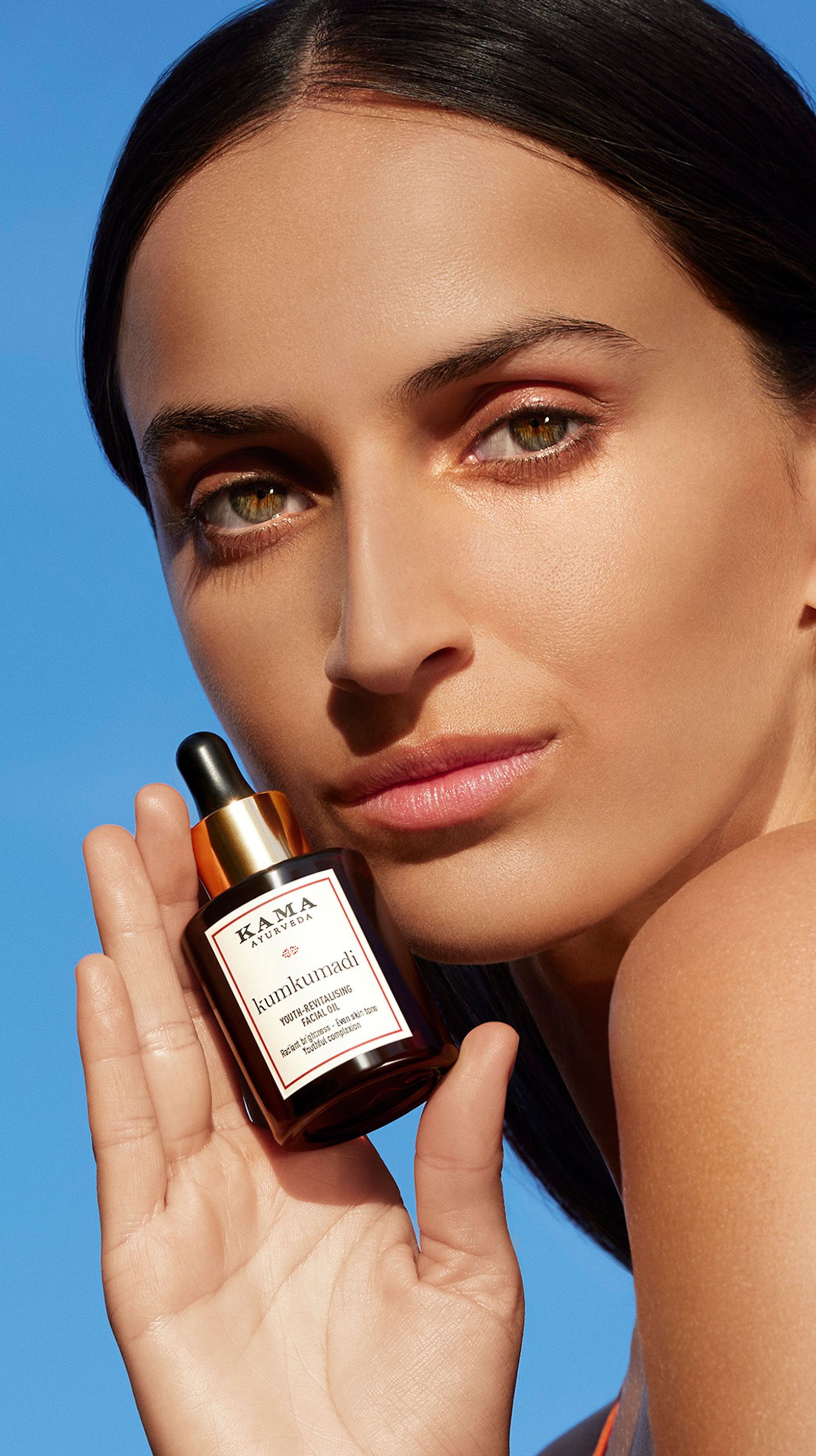 Image may contain bottles, cosmetics, perfume avatars and faces