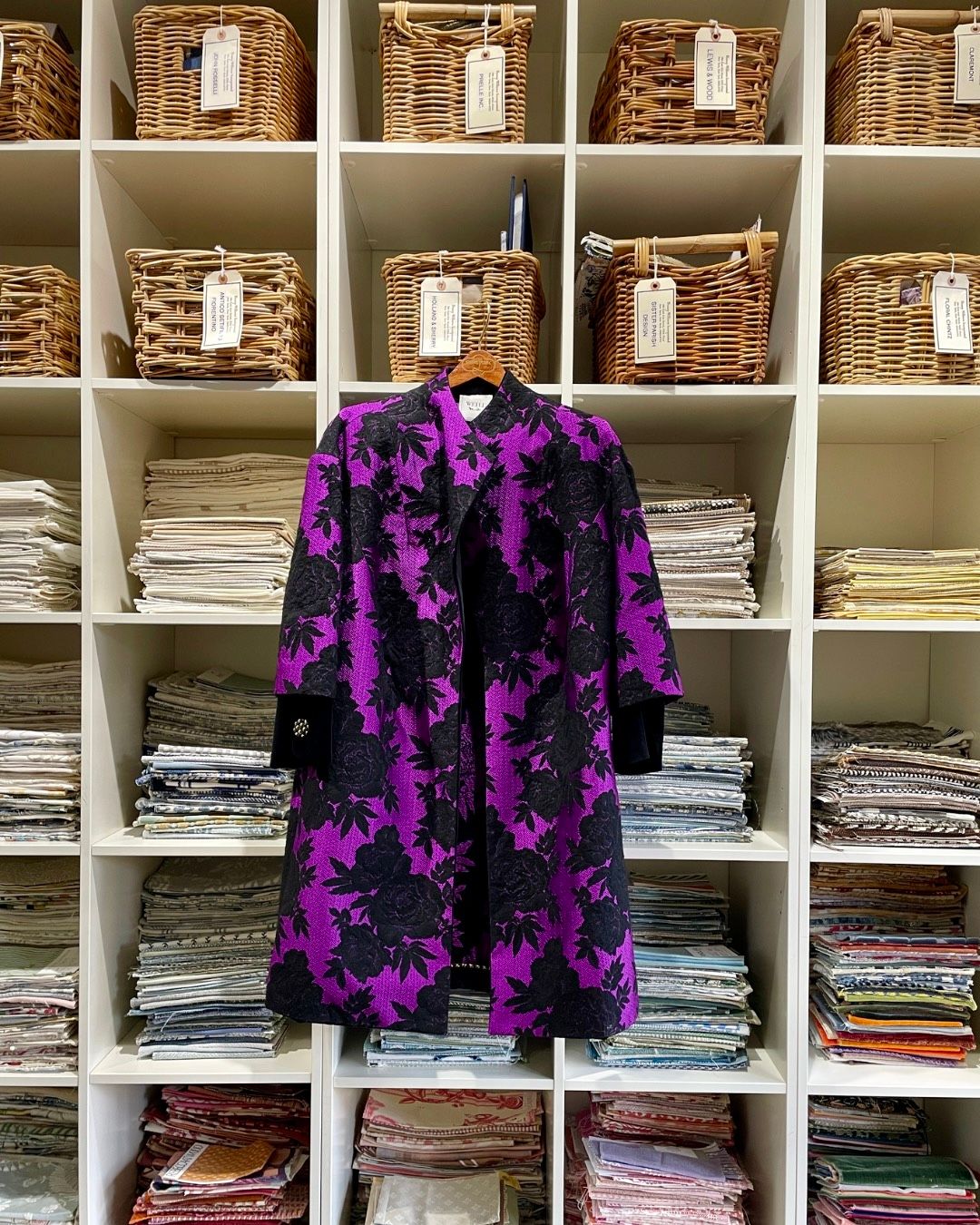 Images may contain furniture, clothing, sleeves, coats, fashionable dresses and formal wear