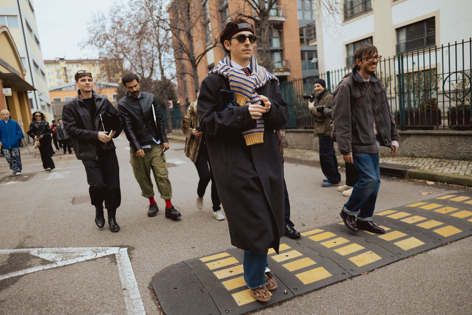 Image may contain Vasiliy Stepanov Bruce Baumgartner pedestrian clothing, outerwear, adult jeans and pants