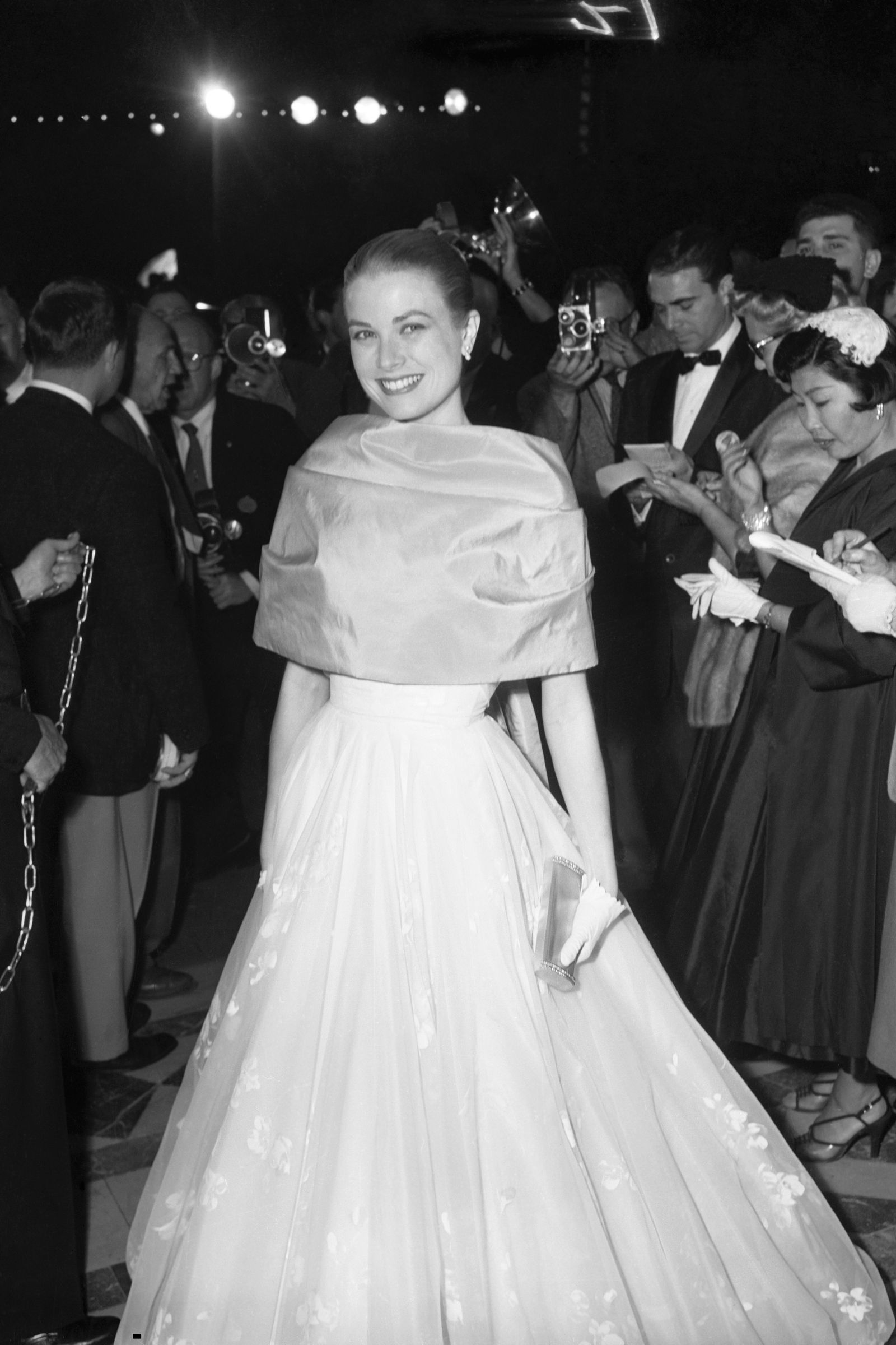 Image may contain Grace Kelly Clothing Dresses Fashion Formal Dresses Wedding Wedding Suits Adults and Individuals