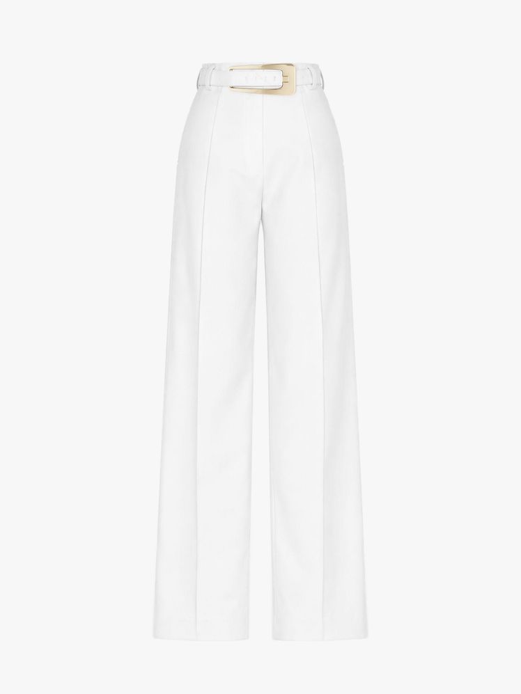 Image may contain: clothes, pants, home decor, linen, skirt and jeans