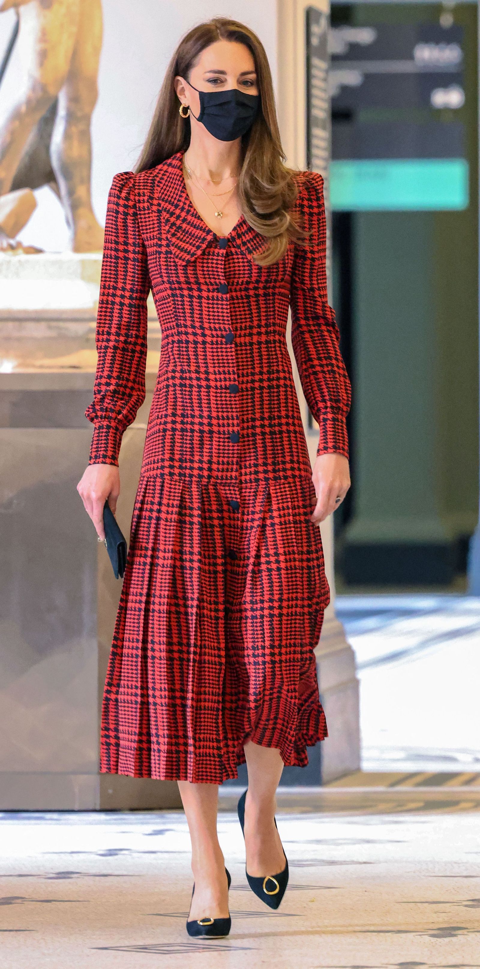 The Duchess of Cambridge wears a face mask while visiting the Victoria and Albert Museum in London.