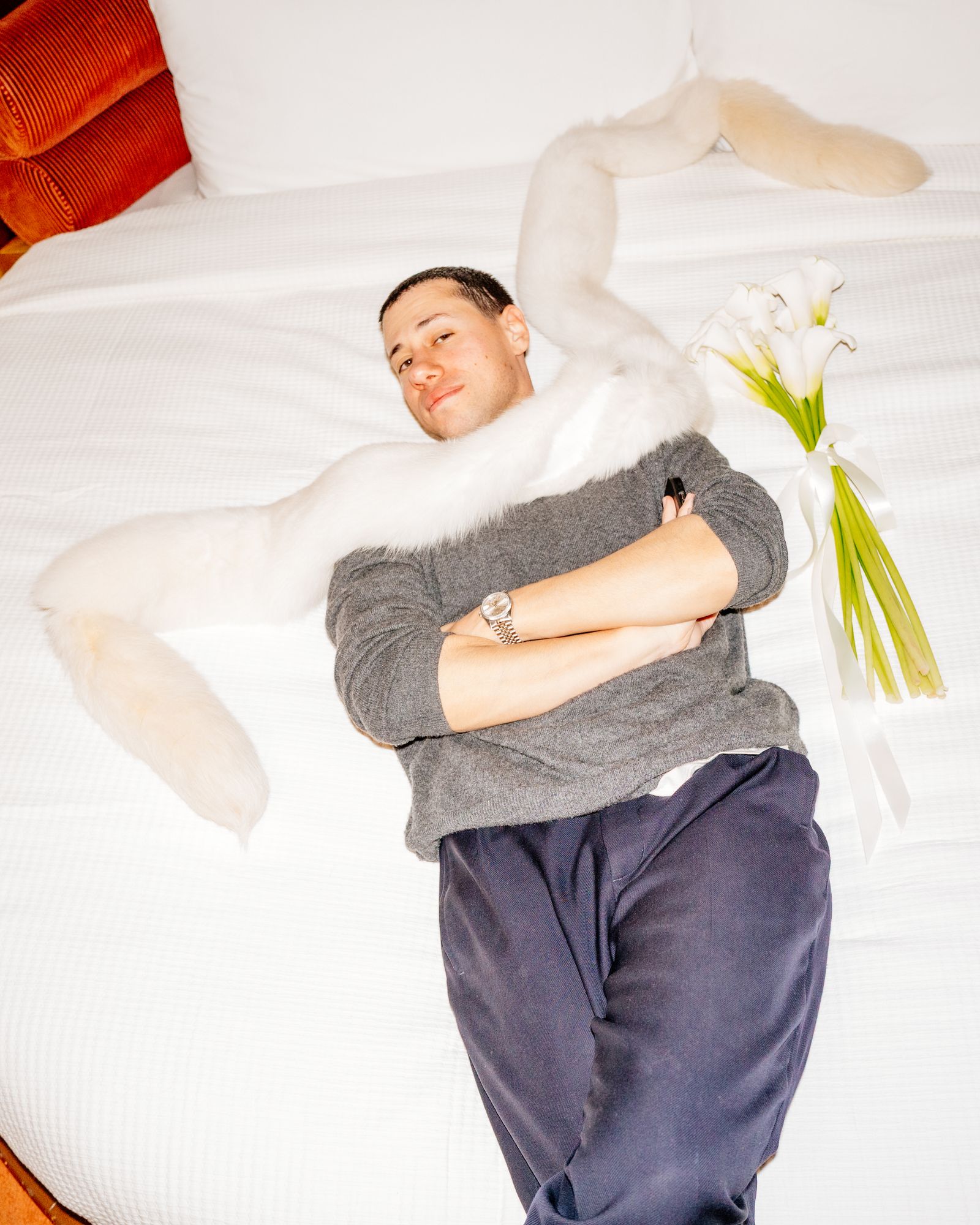 Images may contain faces, heads, people photography, portraits, clothing, pants, flowers, plants, flower arrangements and adults