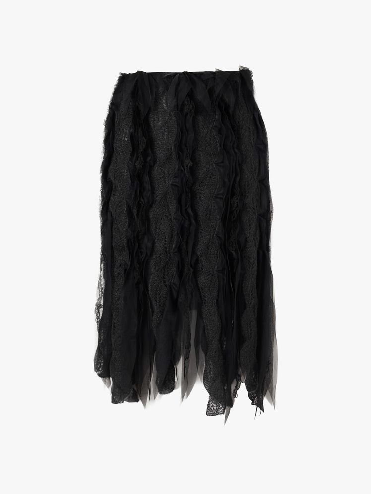 Image may contain: clothes, skirt, coat and miniskirt