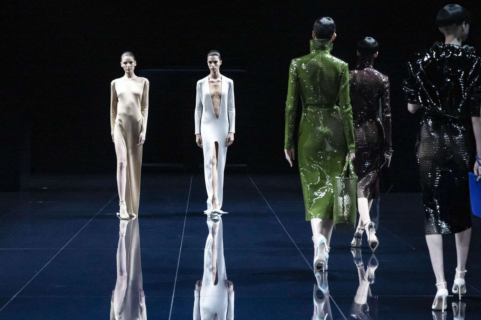 Image may contain adult fashion accessories, bags, handbags, clothing and outerwear