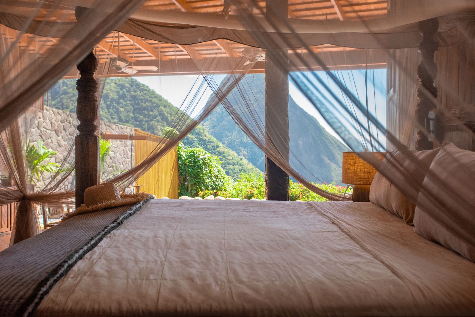 Image may contain furniture, beds, bedrooms, interior rooms and canopy beds