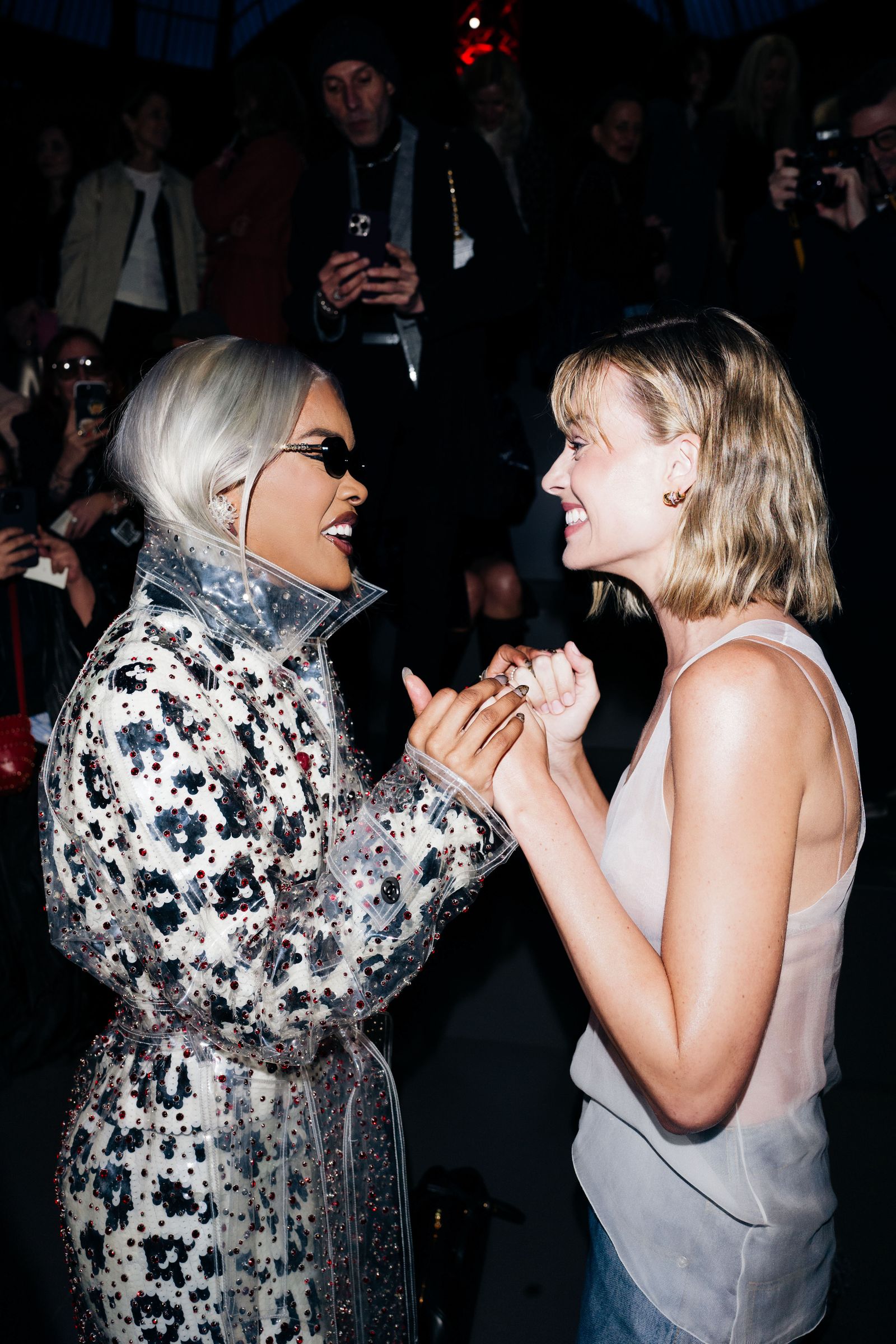 Image may contain Teyana Taylor Margot Robbie Adult Face Happy Laughing Accessories Bags and Totes