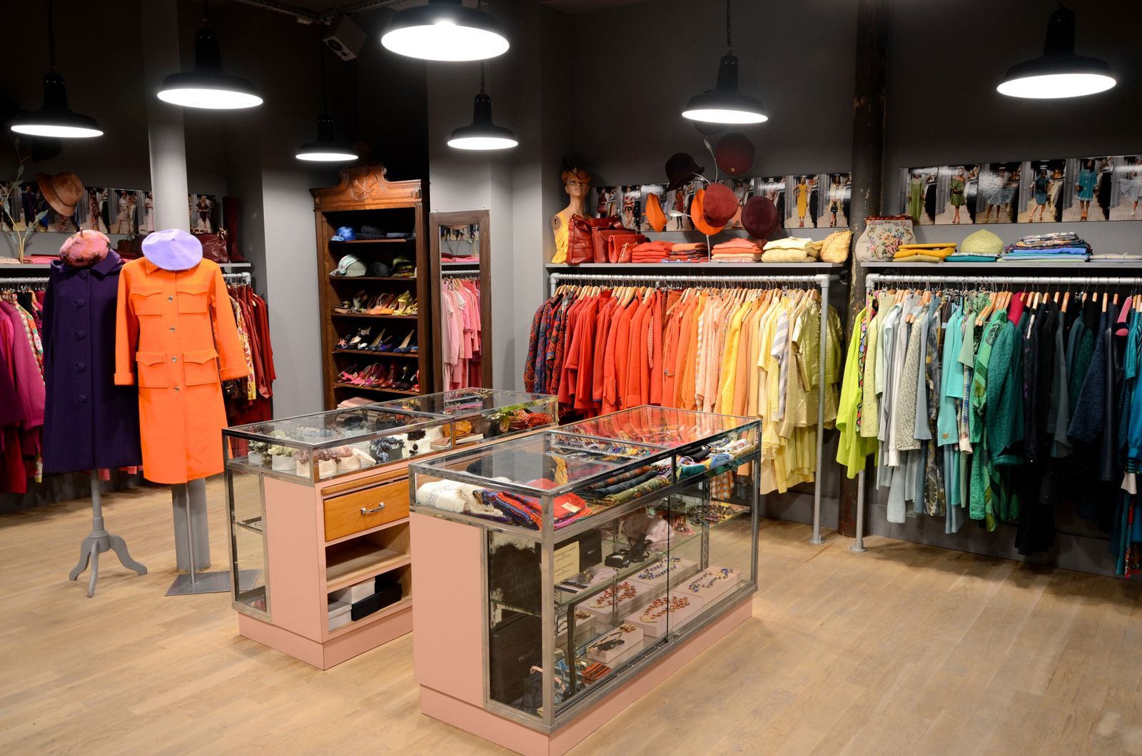 Image may contain Boutique Lights, Interior Clothing, Hats, People, Adult Accessories, Bags and Totes