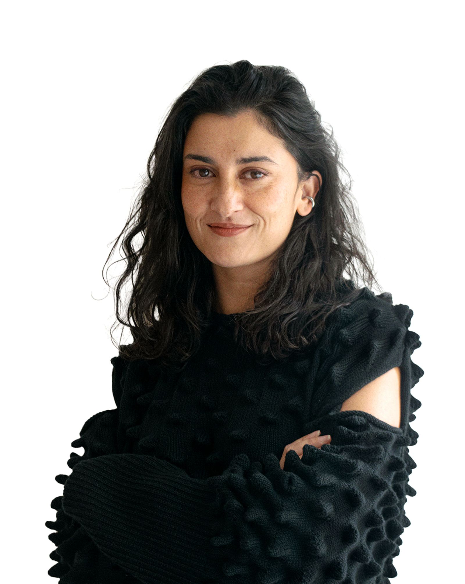 Image may contain Zana Briski Face Head Person Photography Portrait Happy Smile Adult Clothing and Long Sleeves