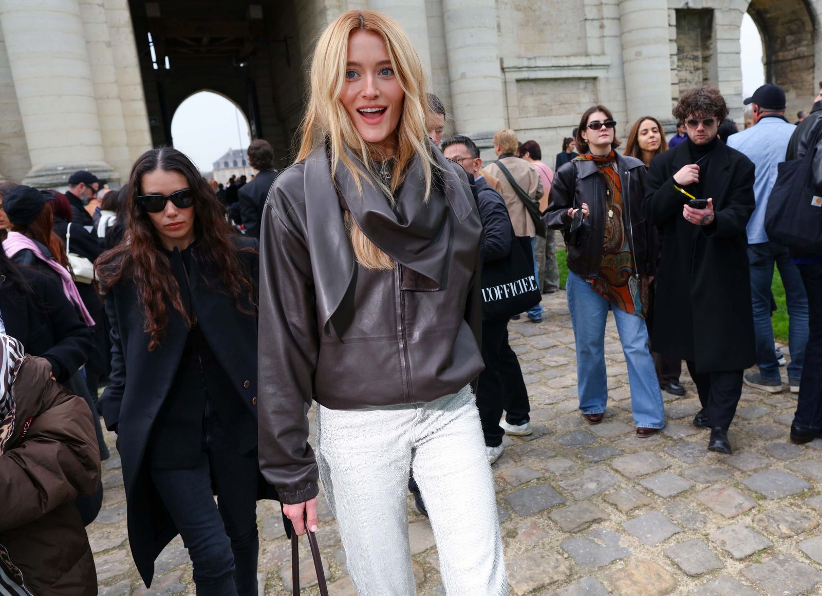 Image may contain Natascha McElhone PenEk Ratanaruang Monica Ramon clothing coat jacket pants blonde and hair