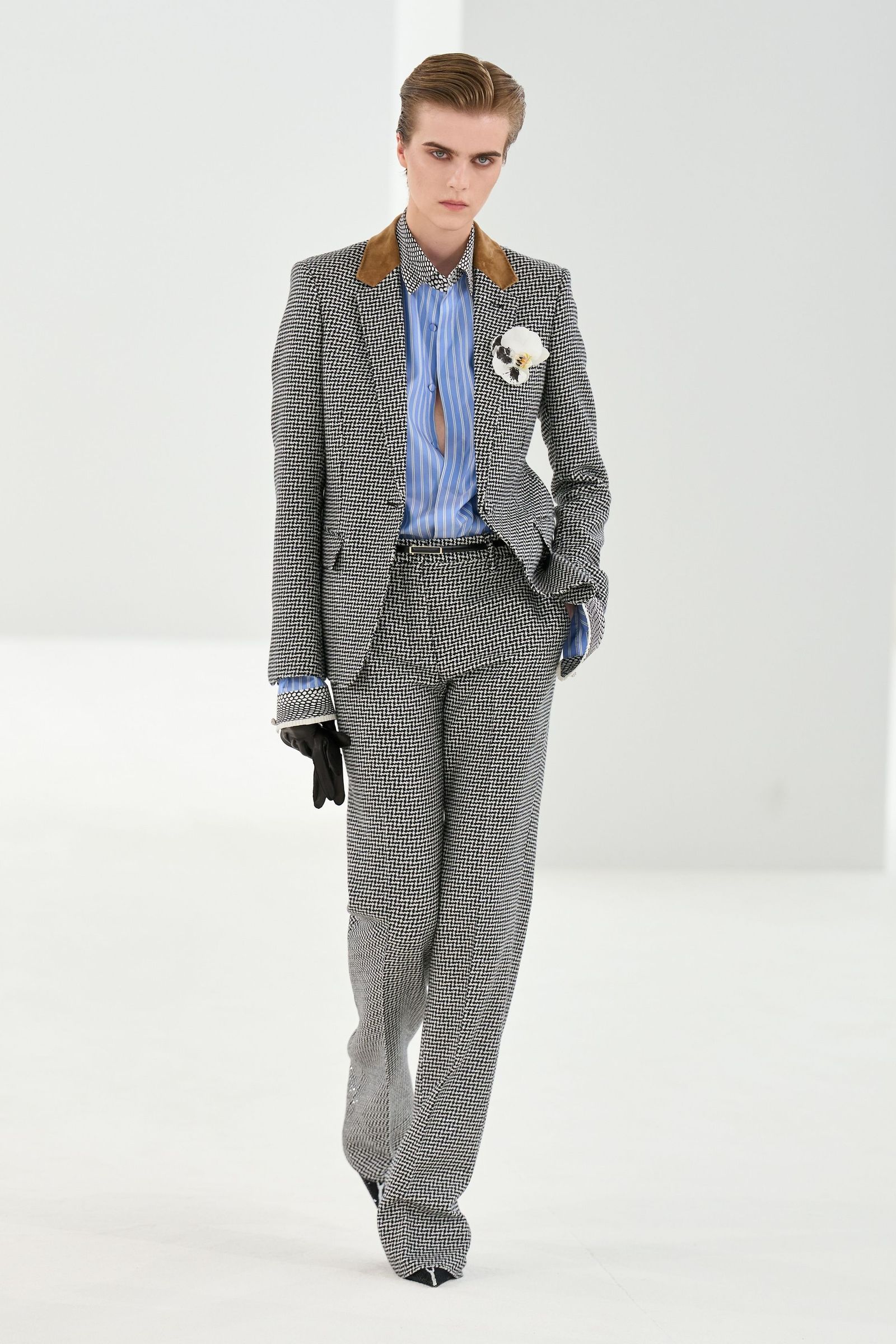 Image may contain clothing formal blazer jacket blazer adult and tuxedo