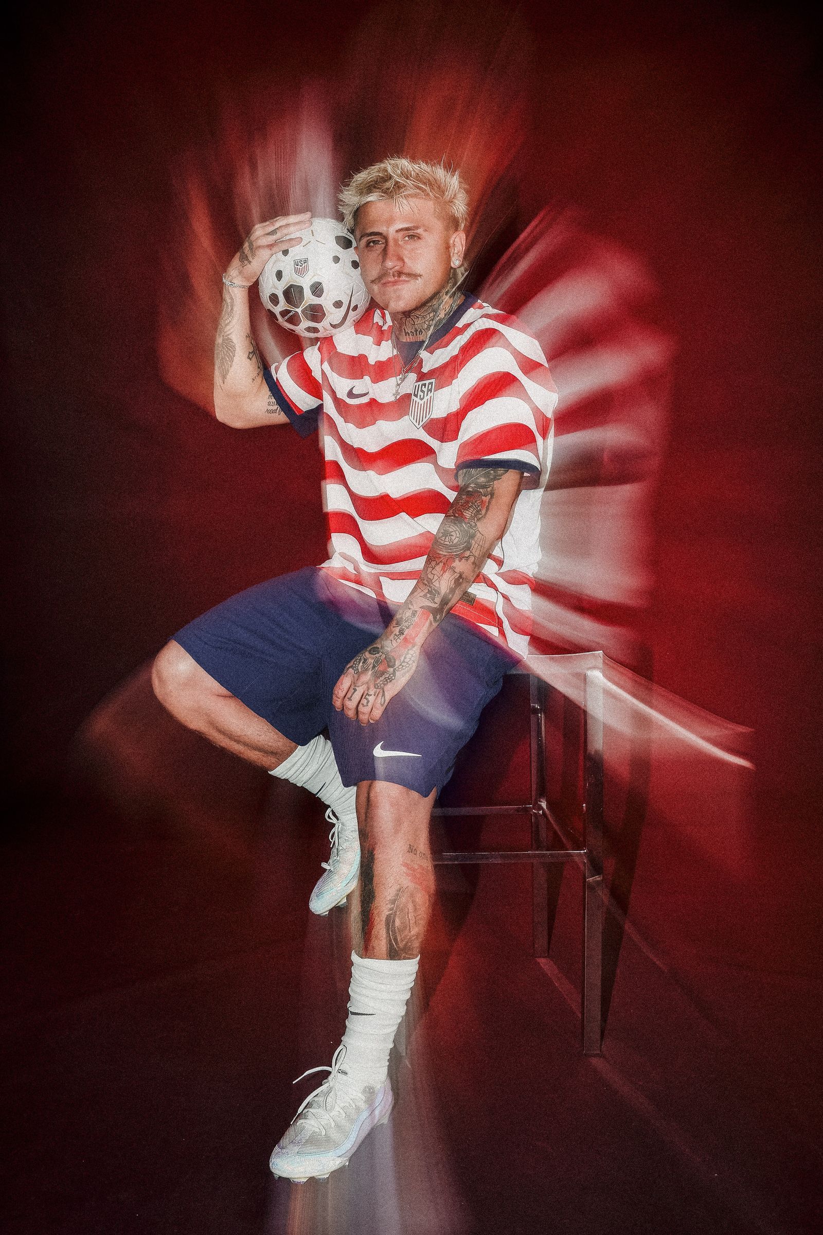 Image may contain faces, heads, people photography, portraits, balls, soccer, soccer, sports and clothing