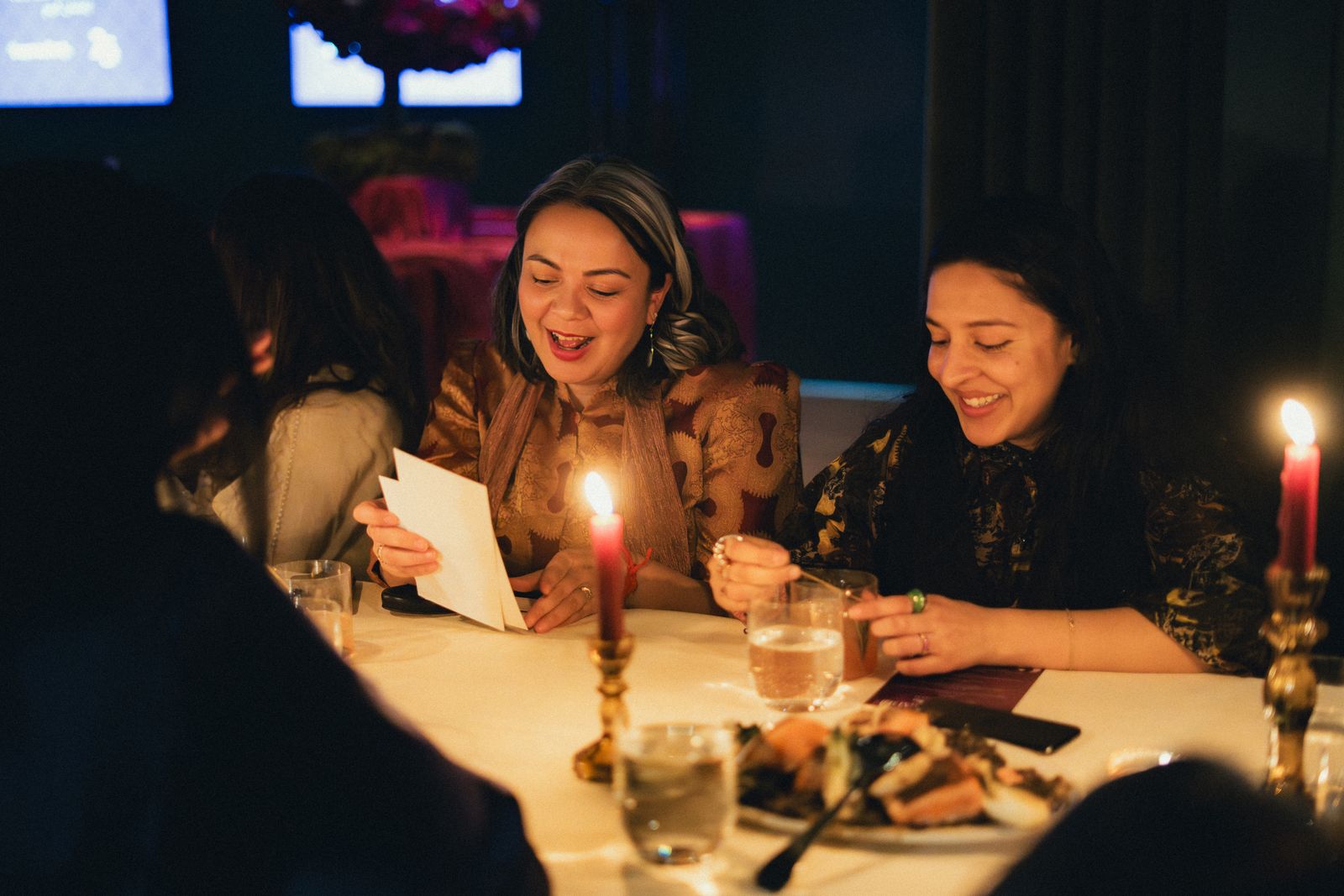 Image may contain adult heads, wedding candles and cups