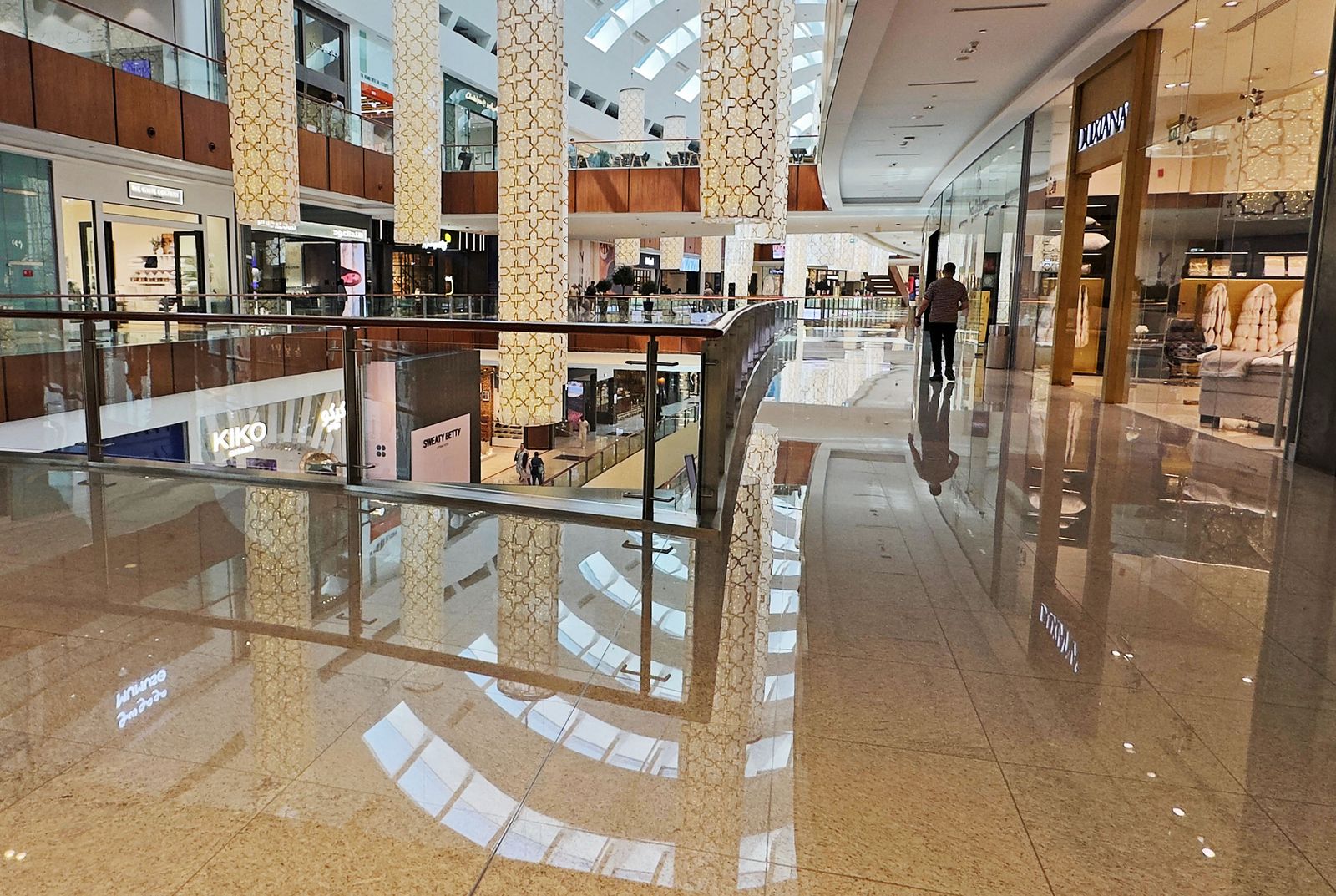 Image may contain store shopping mall floor people floor plants furniture and interior