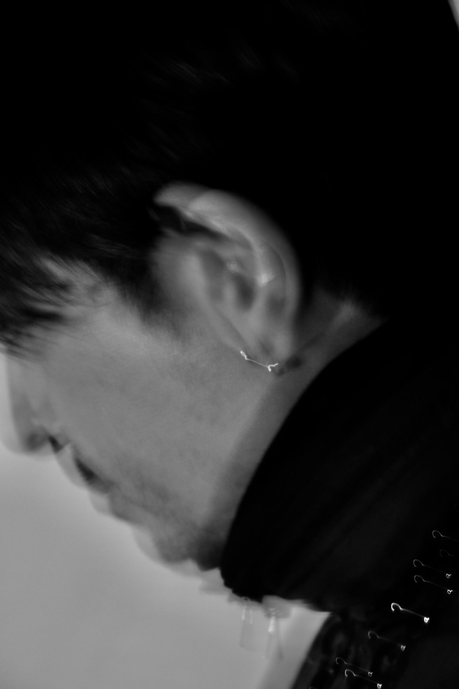 Images may contain accessories, earrings, jewelry, faces, heads, photographic portraits, adult body parts, ears and necks