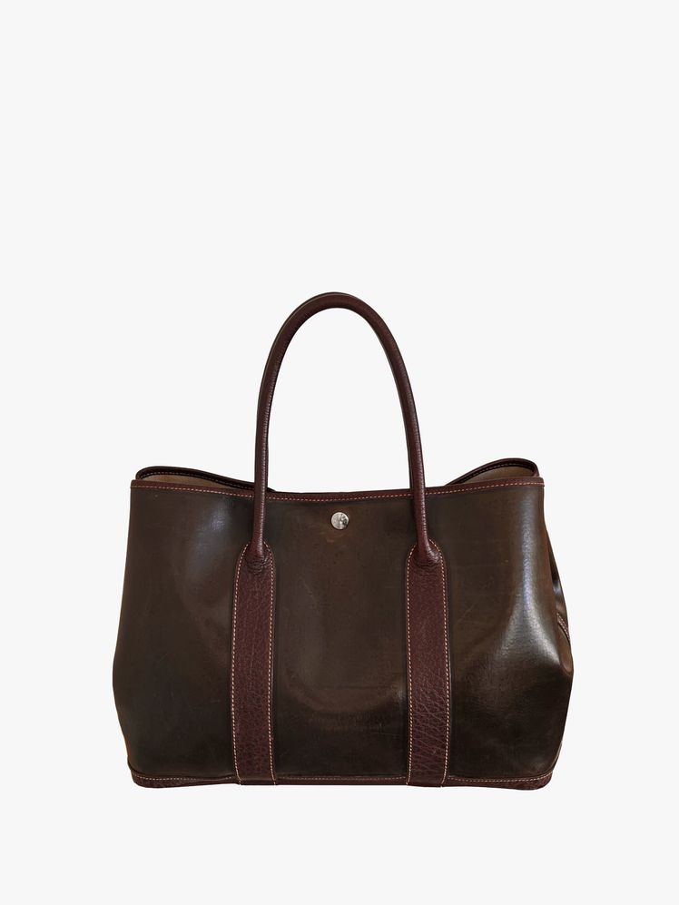 Image may contain: accessories, bag, handbag, handbag and wallet