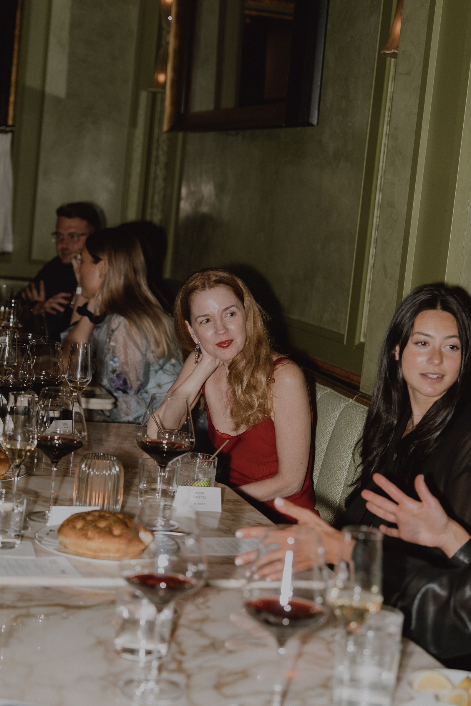 Image may contain Suzanne Collins adult bakery food city accessories glasses fun party mugs and people