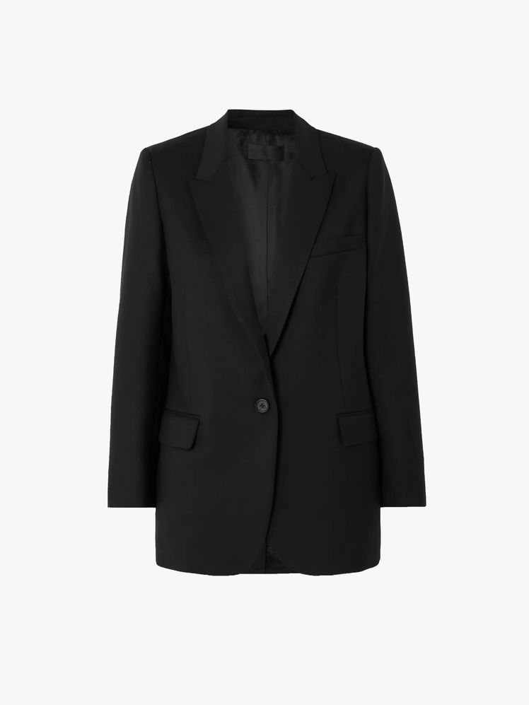 Image may contain: blazer, clothing, coat, jacket, formal suit, suit and tuxedo