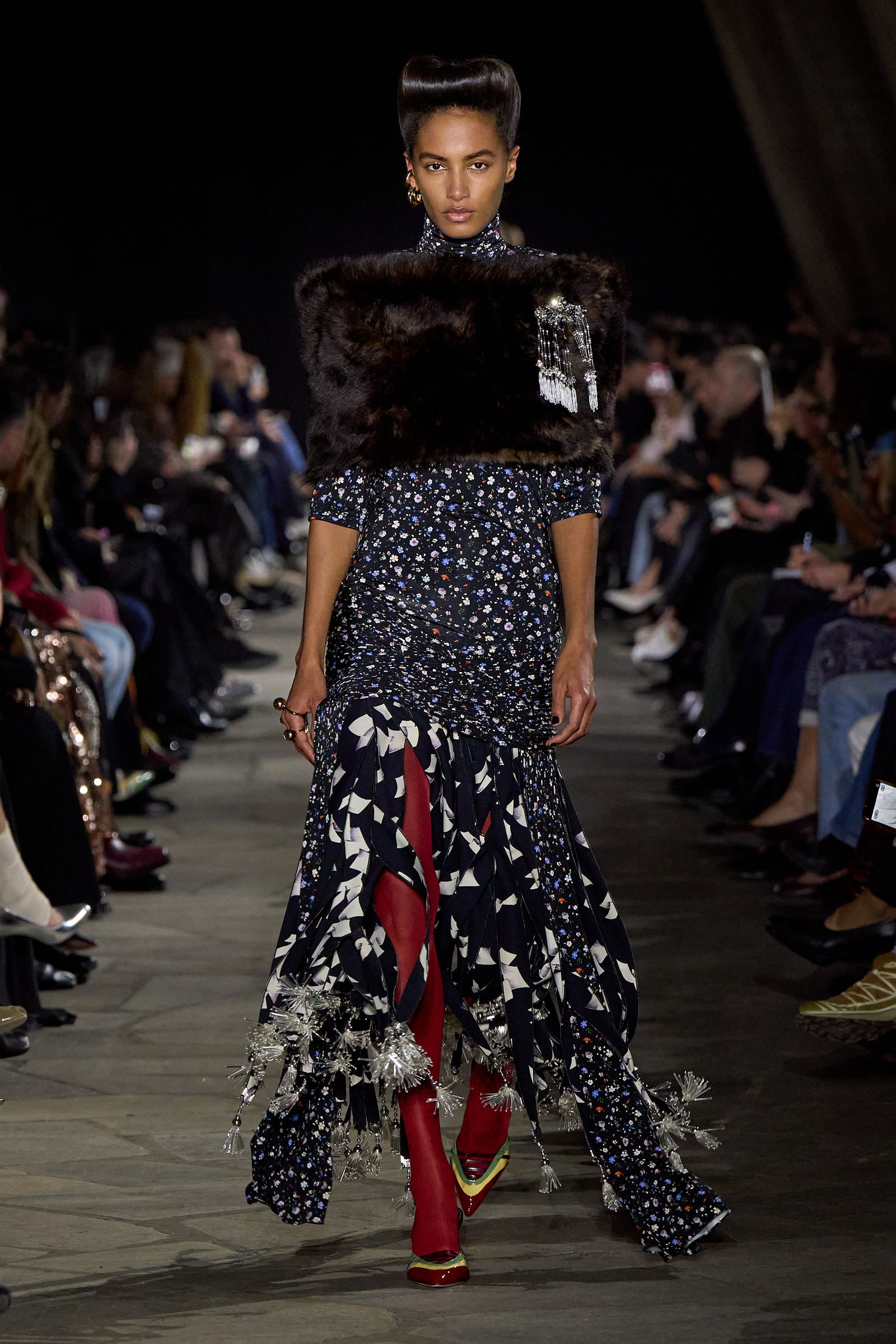 Image may contain adult fashion apparel, pants, dresses, runway footwear and shoes