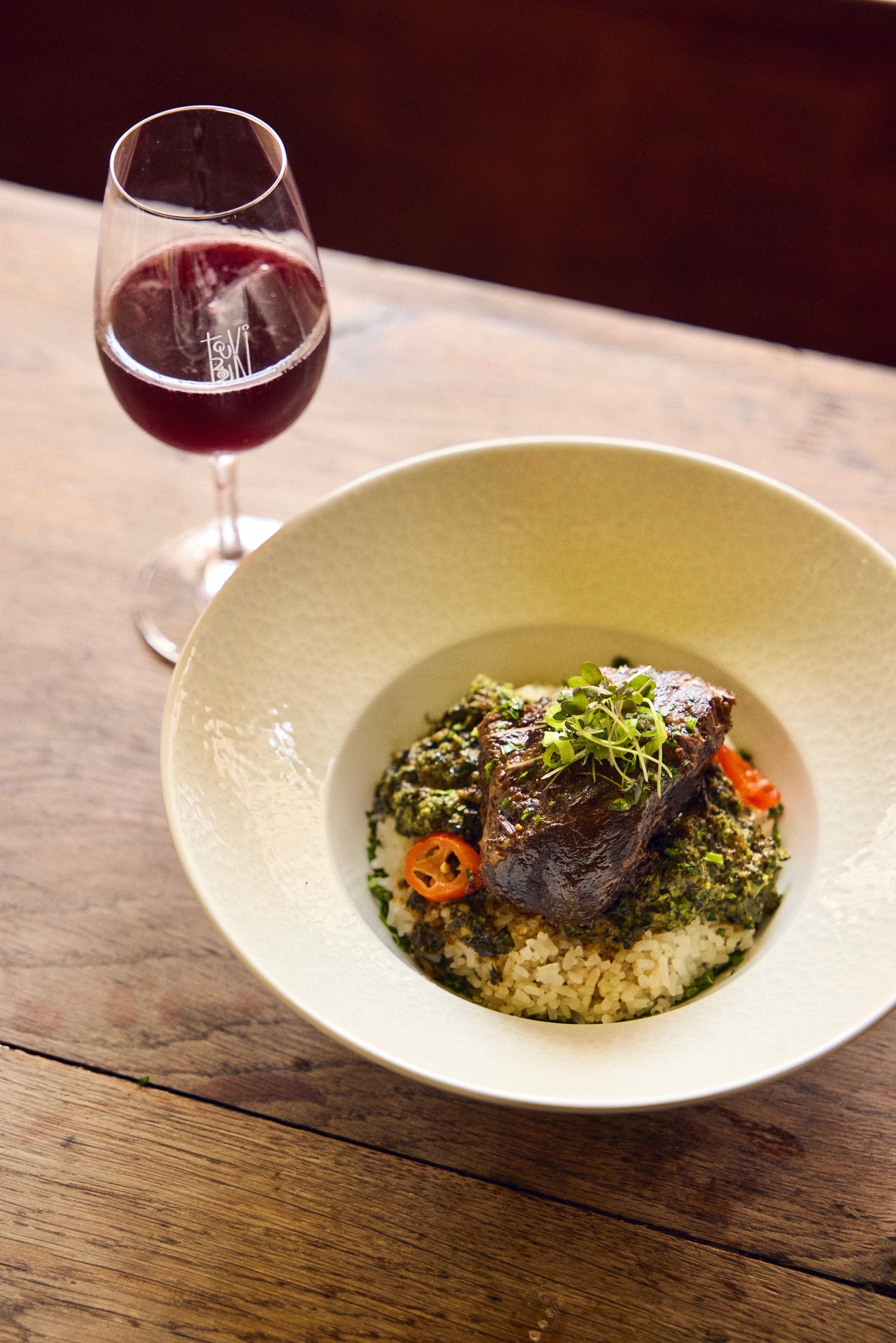 Image may contain food food display glass plate alcohol drink red wine beef meat and meal