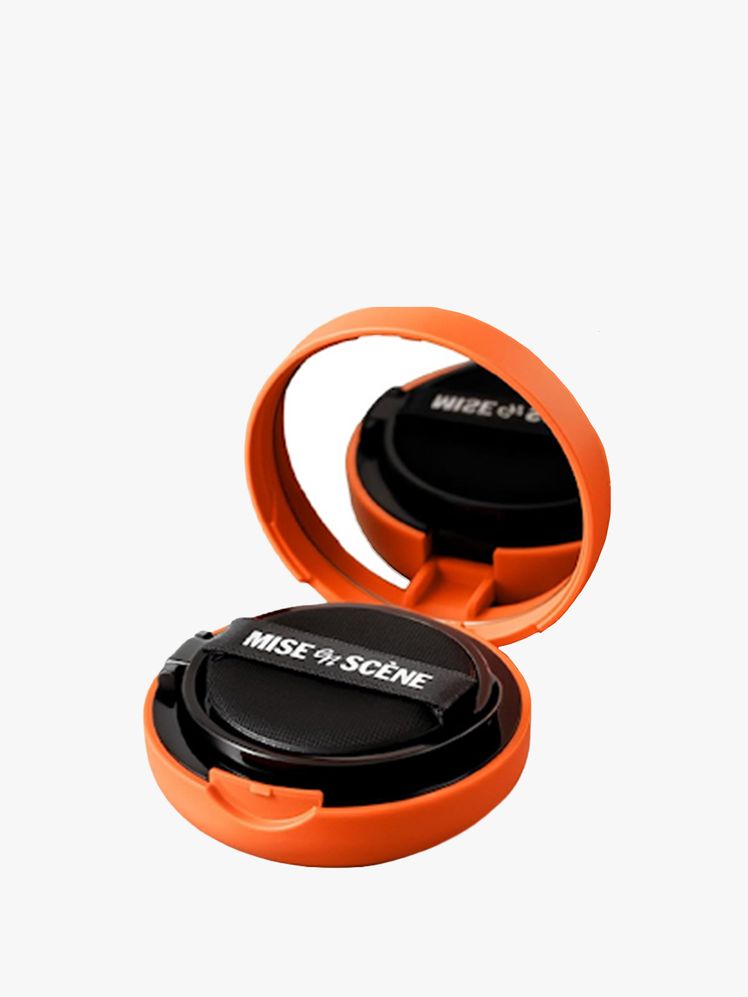 Image may contain: electronics, camera lens, lens cap and headphones