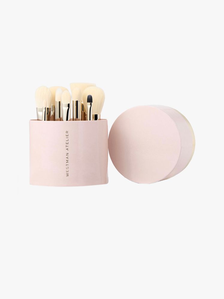 Image may contain: brush, equipment, tools, cosmetics, head and people