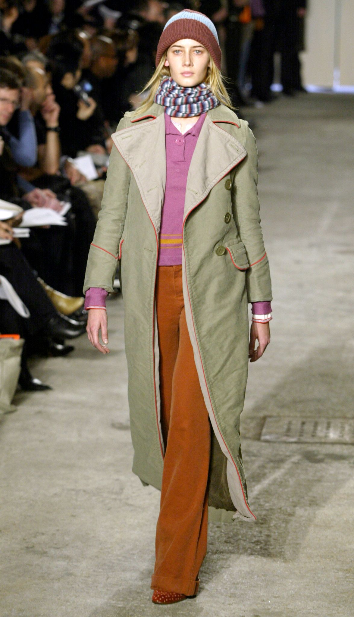 Image may contain Andreas Urs Sommer clothing coats coats adult fashion face head and scarf