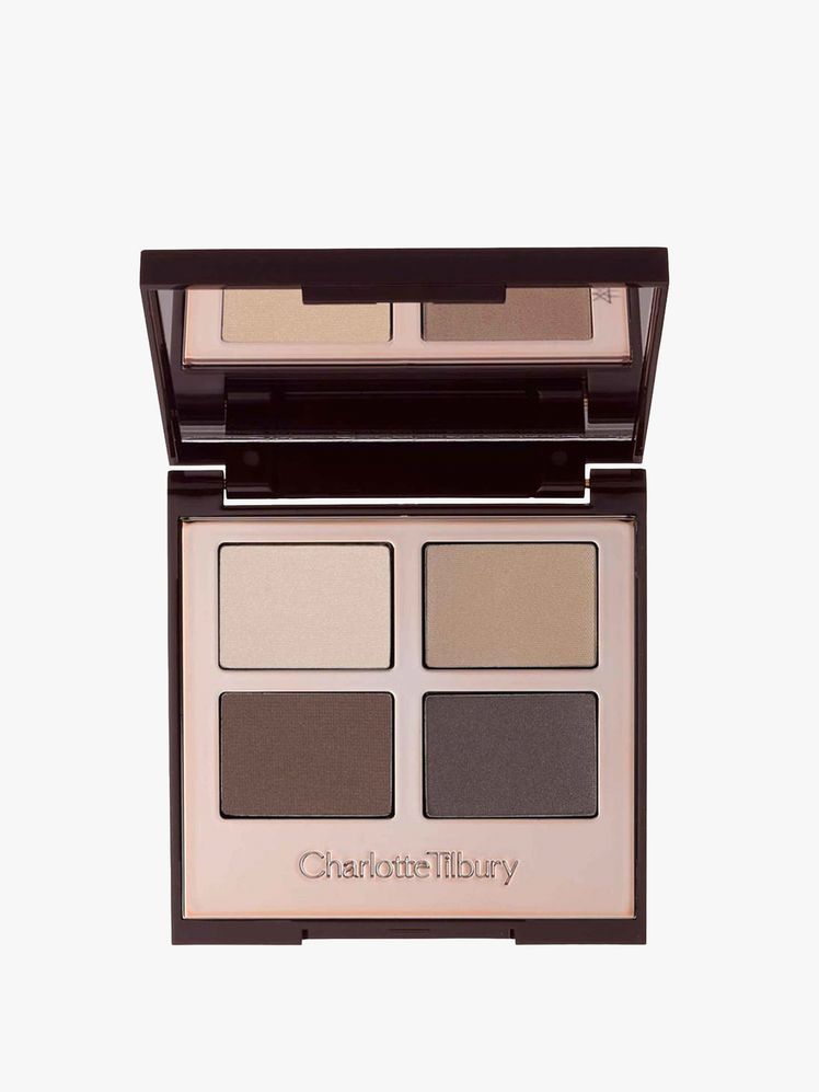 Image may contain: head, person, face, mailbox, paint container, cosmetics and palette