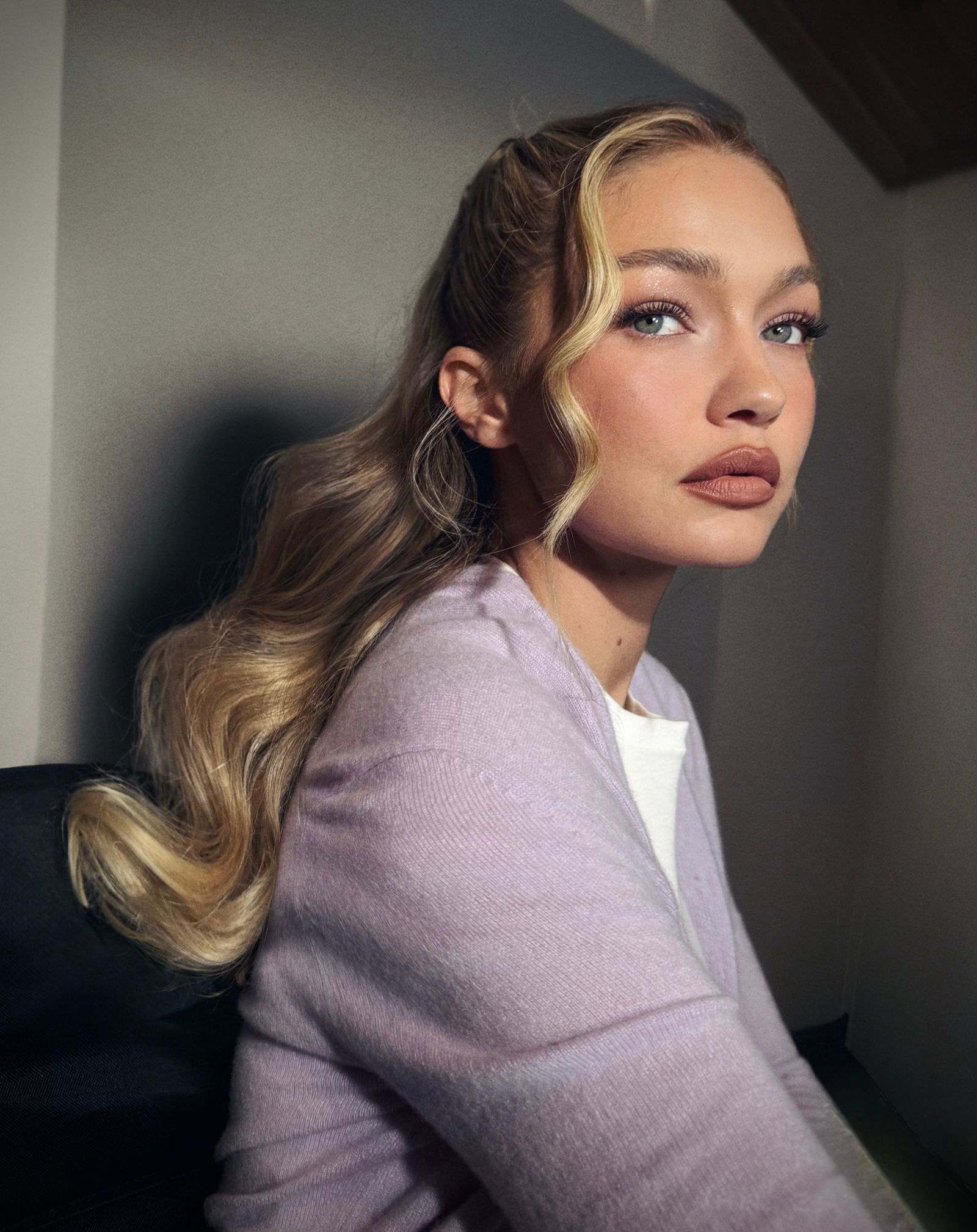 Image may contain Gigi Hadid hair, blonde and adults