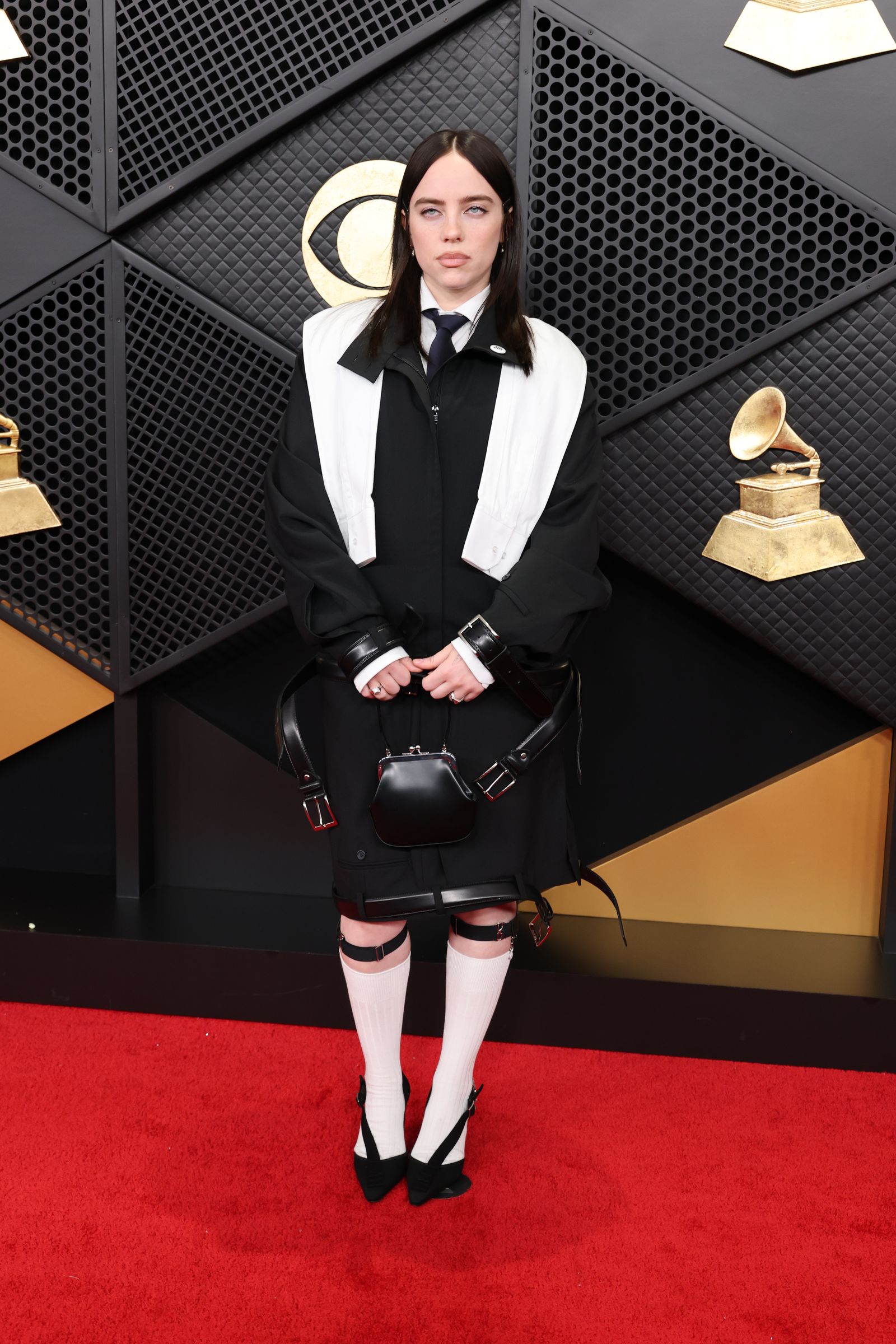 Image may contain Billie Eilish Clothing Skirts Fashion Accessories Formal Ties Adults Tartans and Coats