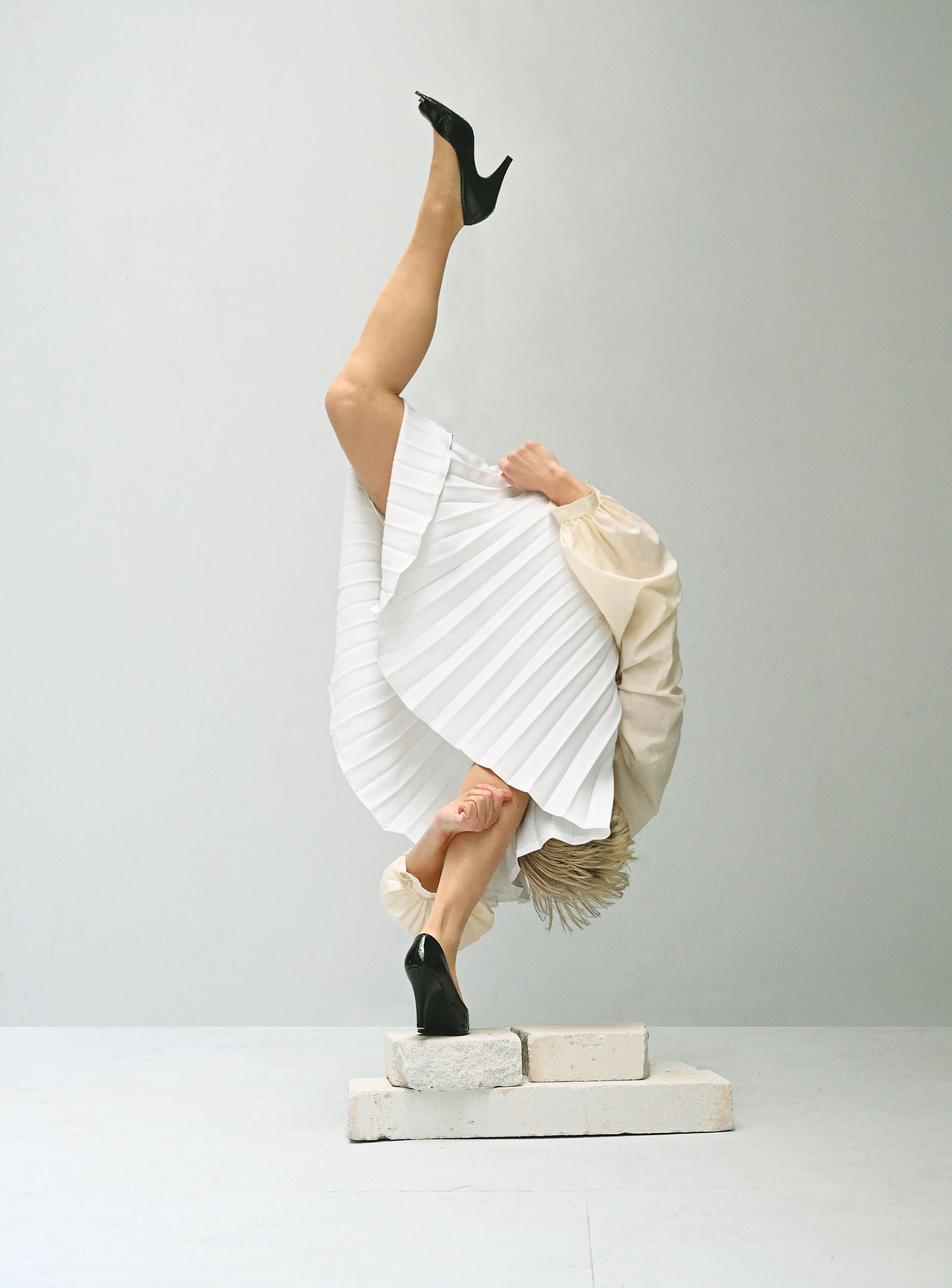 Image may contain clothing, footwear, adults, dancing, casual activities and high heels