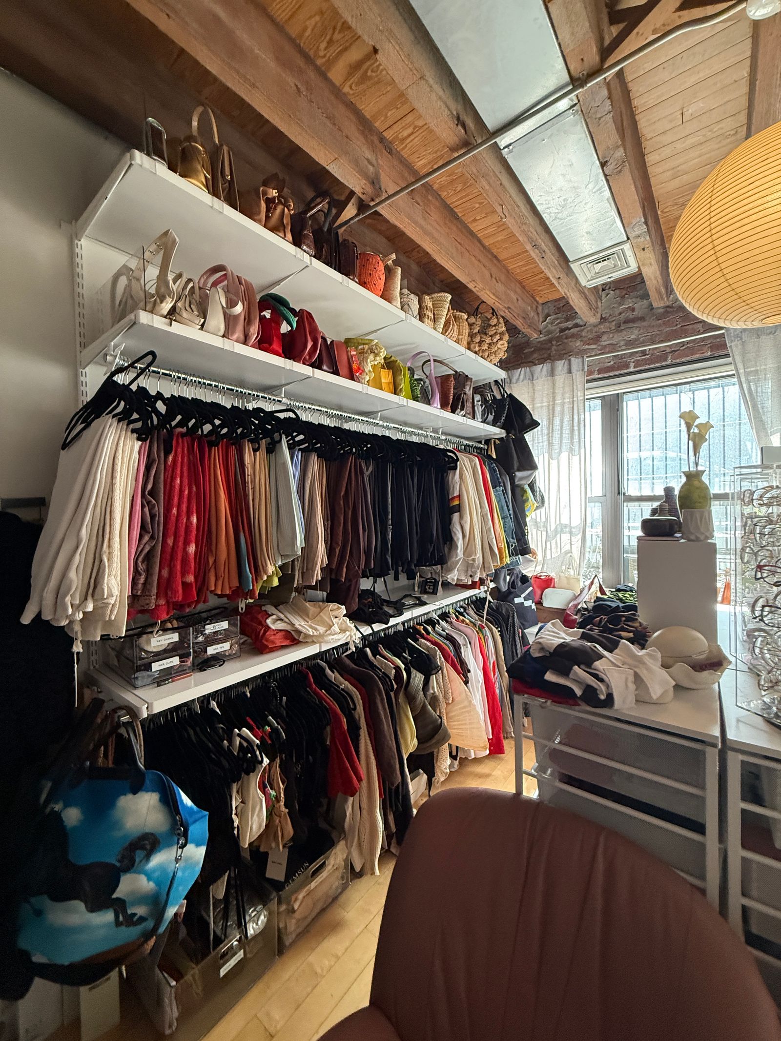 Images may contain interior accessories, bags, handbags, walk-in wardrobes, furniture, clothing, shoes and high heels