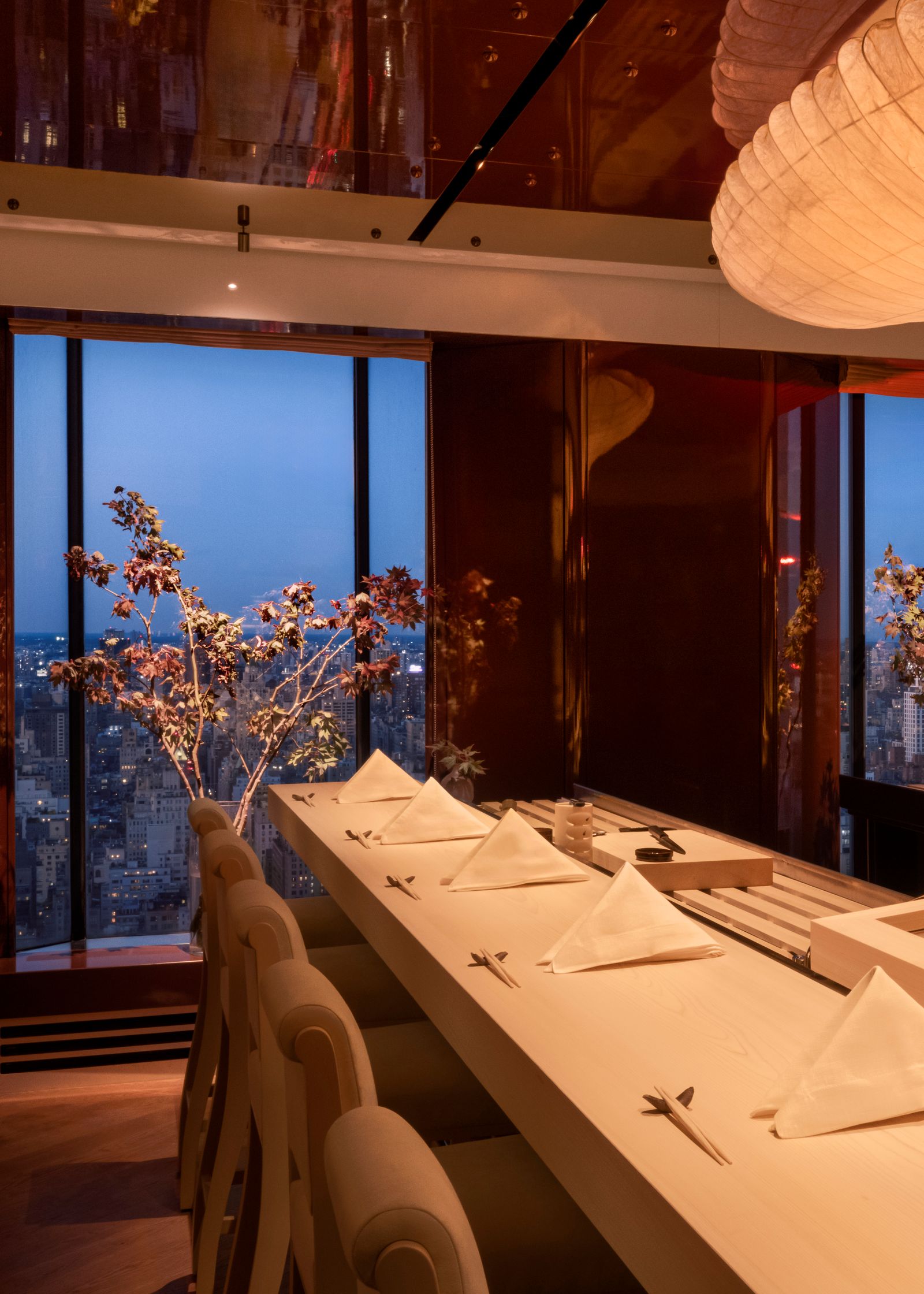 Image may contain interior interior design dining table, furniture, table, architecture, restaurant and room